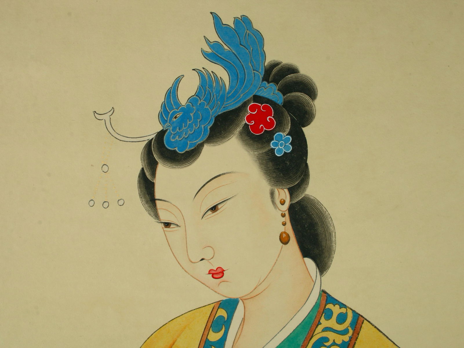 SCROLL A BEAUTY IN ROBES: A demure beauty is wearing robes with a yellow overcoat. She's holding a fan behind her and has kingfisher hair adornments. Calligraphy and artist mark on left. P