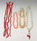 LOT OF BRANCH CORAL, COWRIE SHELL, BONE NECKLACES