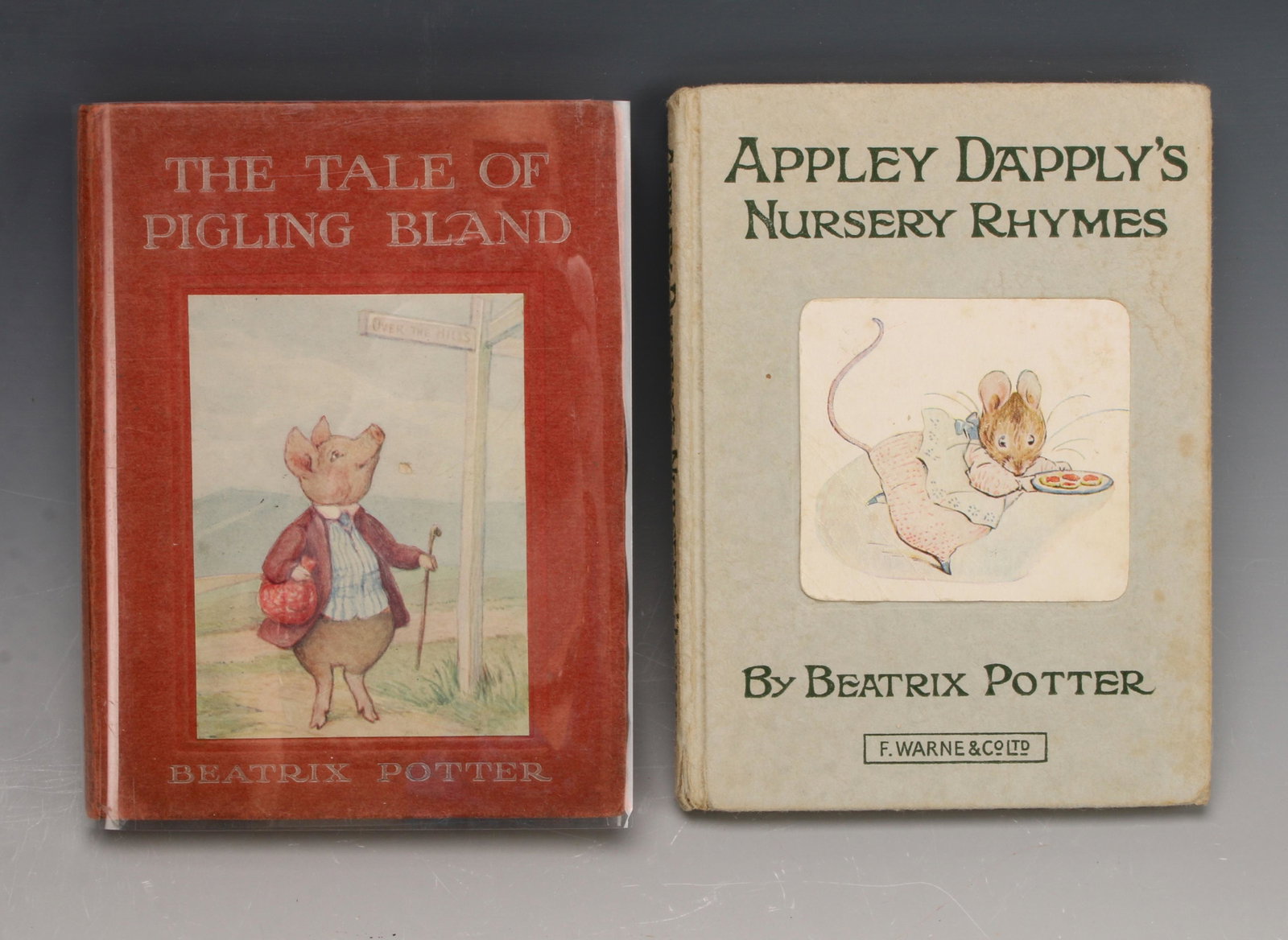TWO EARLY BEATRIX POTTER BOOKS PUB. WARNE: Early editions of The Tale of the Pigling Bland, and Appley Dapply's Nursery Rhymes. Publisher: Frederick Warne, London UK. Circa 1920 4 1/2" X 5 1/2" $200 - $400 Please contact us fo