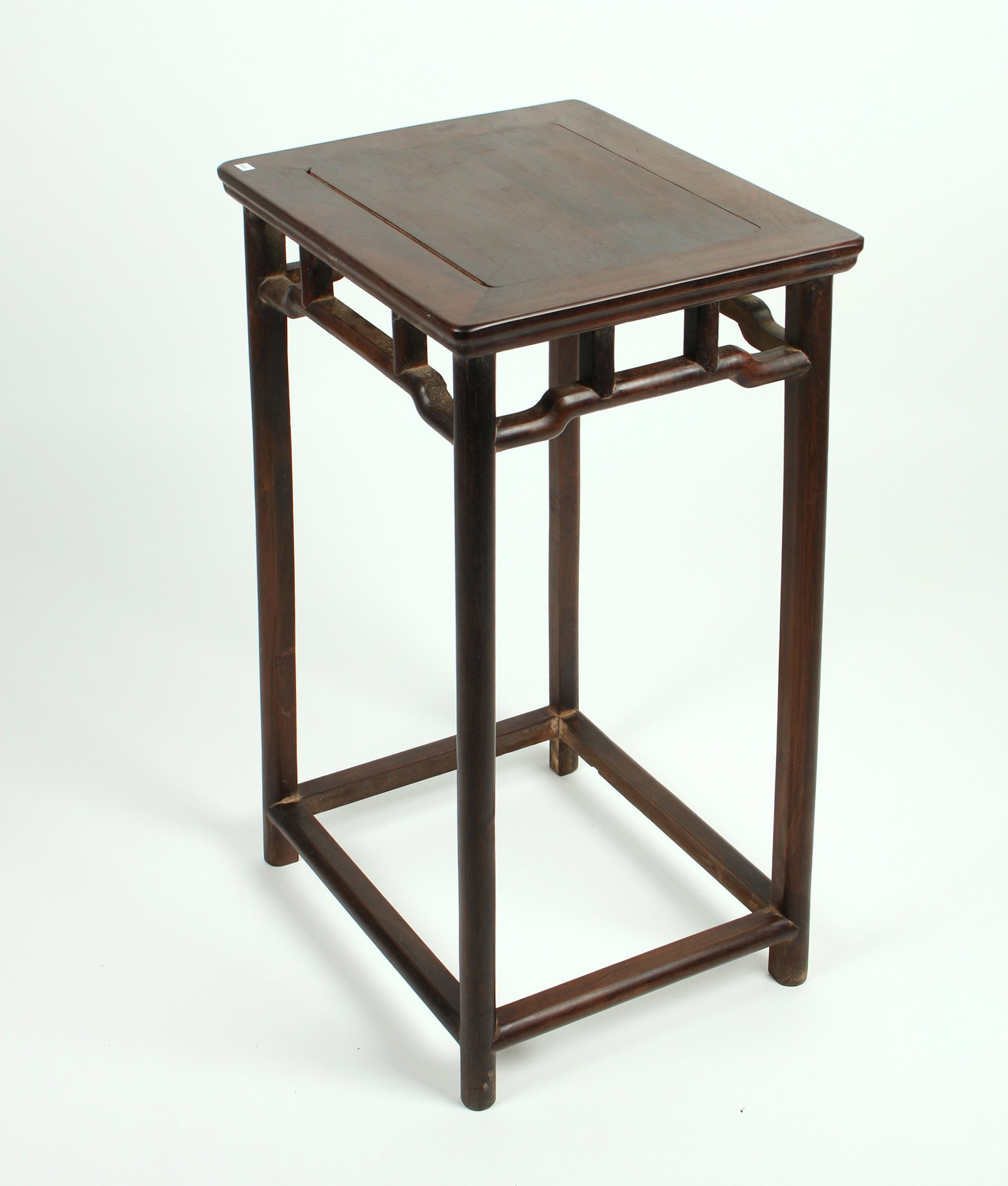 CHINESE CURVED APRON END TABLE: With floating panel top and an open curved apron. 16 1/2" X 13 3/4" X 27 1/2" $400 - $600 Please contact us for high resolution images of this lot. Shipping: