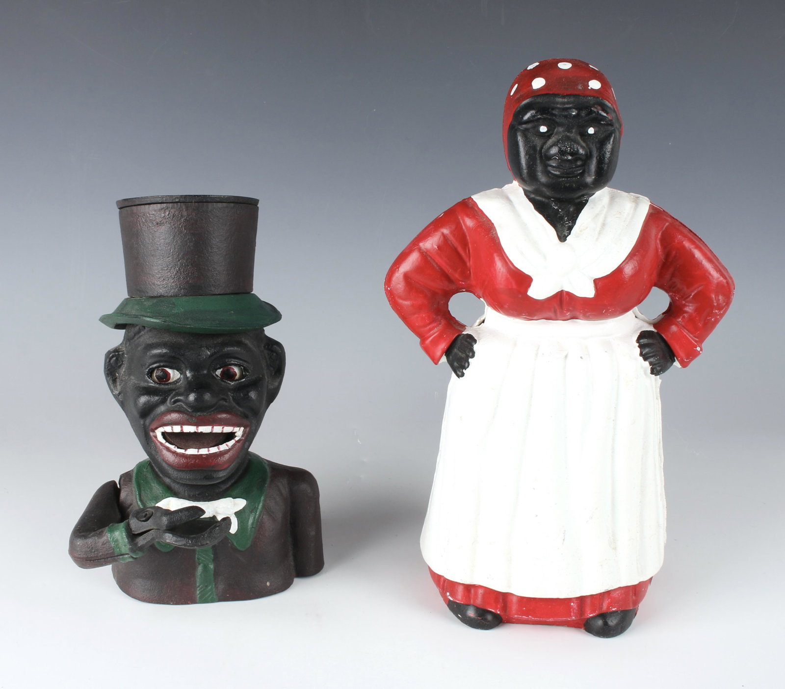 VINTAGE REPRODUCTION JOLLY & AUNT JEMIMA BANK: Aunt Jemima/Mammy in read and white, and jolly man with top hat. The coin goes in his hand and then in the mouth as his eyes roll back with lever. 5" X 7 3/4" $40 - $80 Please contact