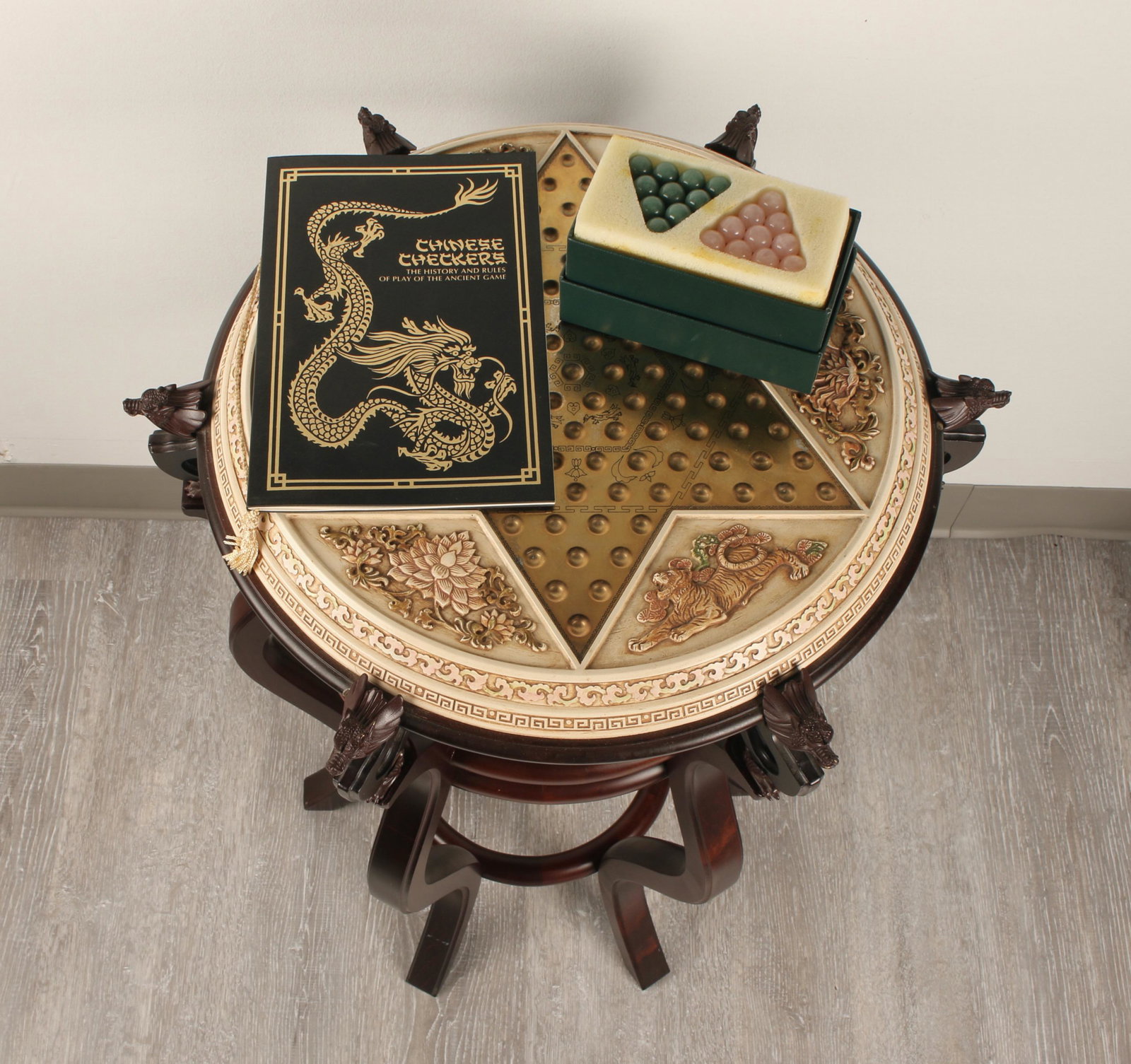 FRANKLIN MINT CHINESE CHECKER TABLE SET: Includes vase stand shape table, checker board, marbles, booklet, and signed certificate of authenticity signed by Rand Castle - Asian Art Museum Director. Learn a new skill or challenge your housemat