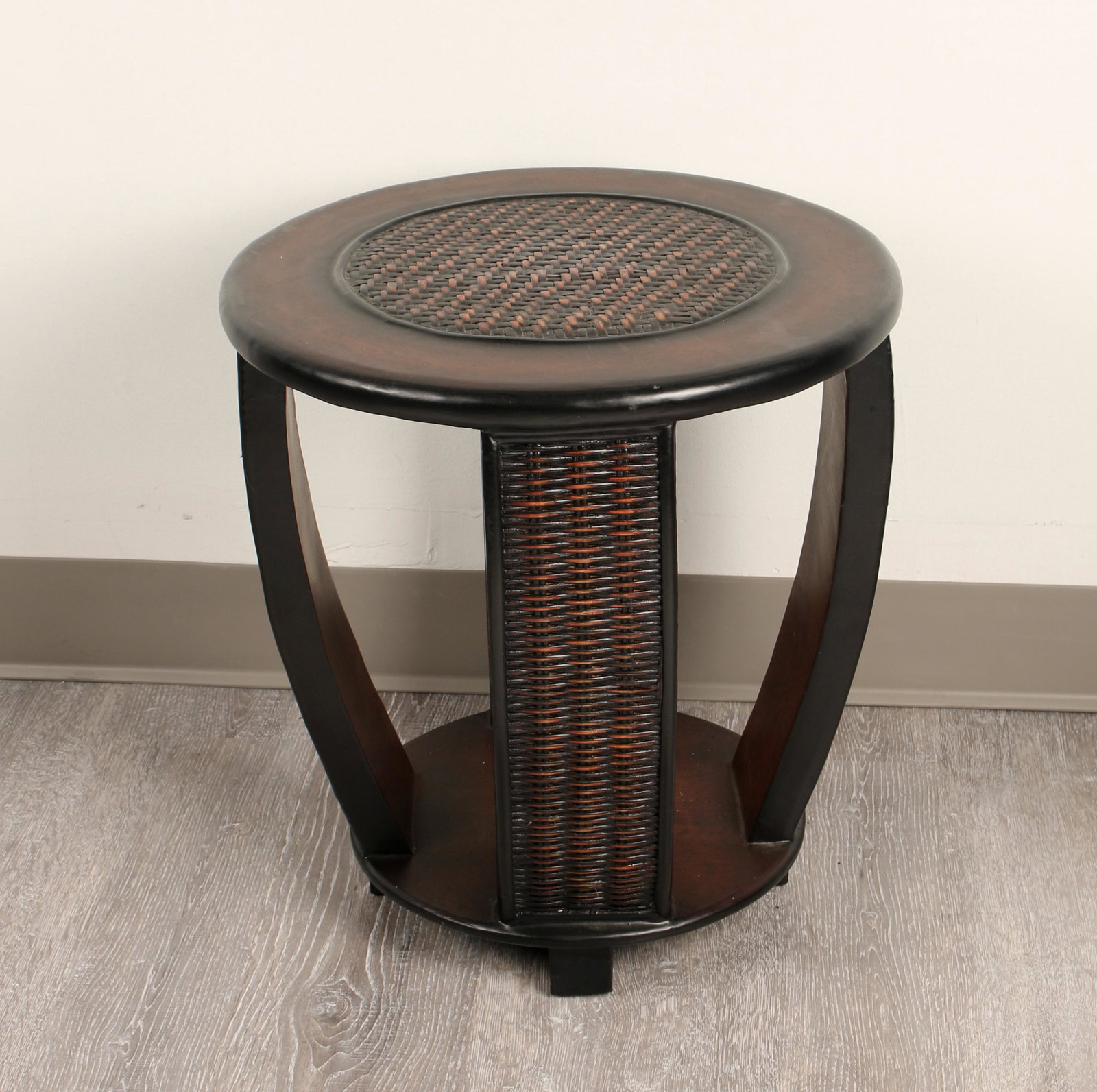 SMALL STOOL END TABLE WITH WOVEN TOP & SIDES: Circular stool/end table with woven top and curved legs with woven decoration. 16 1/2" X 17" $100 - $200 Please contact us for high resolution images of this lot. Shipping: