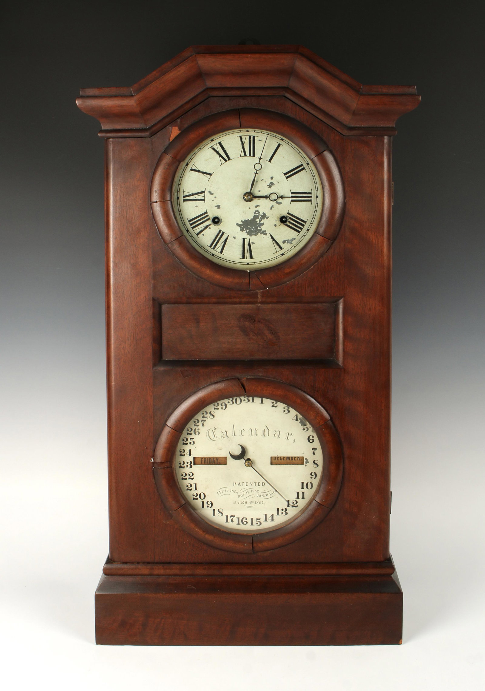SETH THOMAS SHELF CLOCK WITH CALENDAR DIAL.: Double dial, weight driven, time and strike mechanism with perpetual calendar. With key. Pendulum bob. Label dated 1862. 33" X 17 1/2" X 5" $800 - $1200 Please contact us for hig