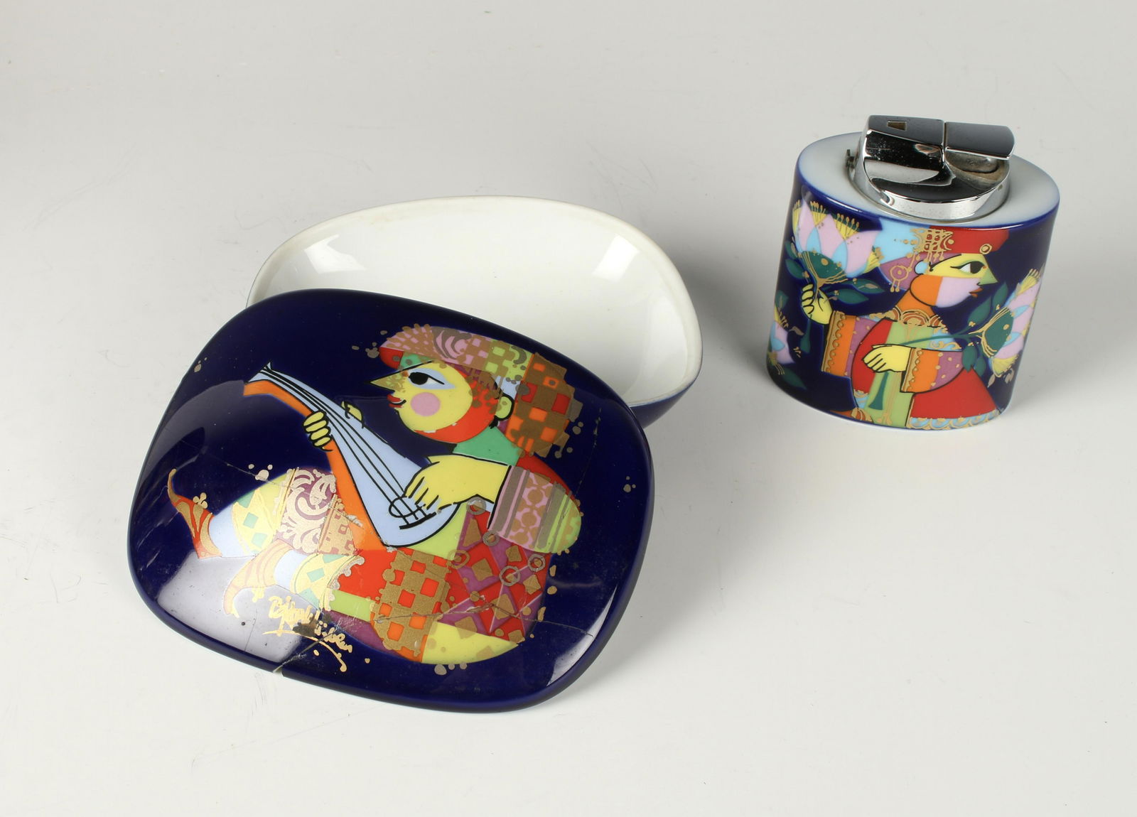 ROSENTHAL WINBLAD 1001 NIGHTS LIGHTER & BOX: Bottom of the porcelain is marked by Rosenthal and Wiinblad and contains Ronson lighter. 4" X 3 1/8" X 2 1/8" $100 - $200 Please contact us for high reso