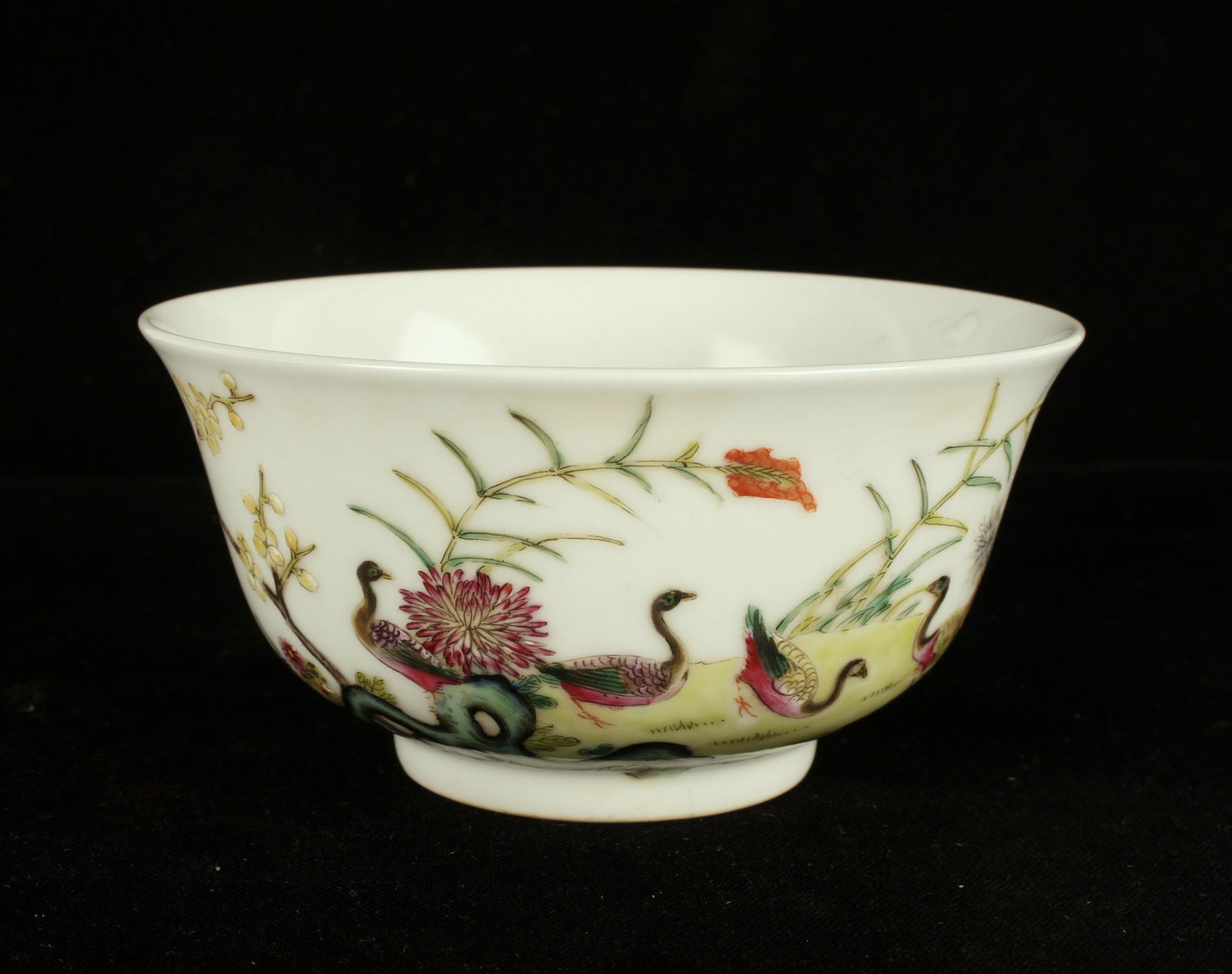CHINESE PORCELAIN GARDEN SCENE BOWL: Ducks are in a garden with water plants. Marked on the bottom. 4 1/2' x 2 1/2" $200 - $400 Please contact us for high resolution images of this lot. Shipping:
