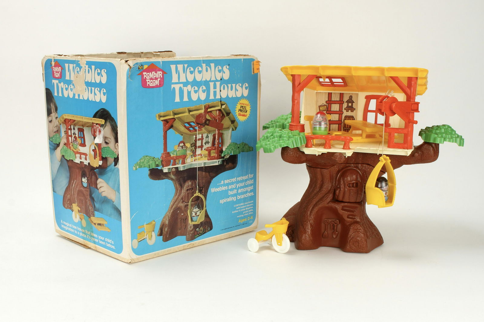 WEEBLES TREE HOUSE COMPLETE IN BOX 1975: A secret retreat for Weebles and your child built amongst the spiraling branches! Includes tree house, with basket elevator, brother and sister, picnic table, rocking chair, and trike. 11 1/2" X