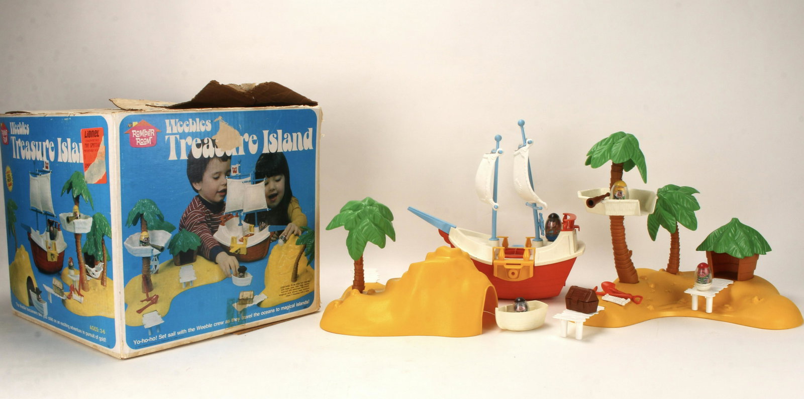 VINTAGE WEEBLES TREASURE ISLAND IN BOX 1975: Yo-ho-ho! Set sail with the Weeble crew as they travel the oceans to magical islands! Includes pirate ship, two islands with trees, cave, cave slide, docks, look-out with telescope, longboat, pick, sh