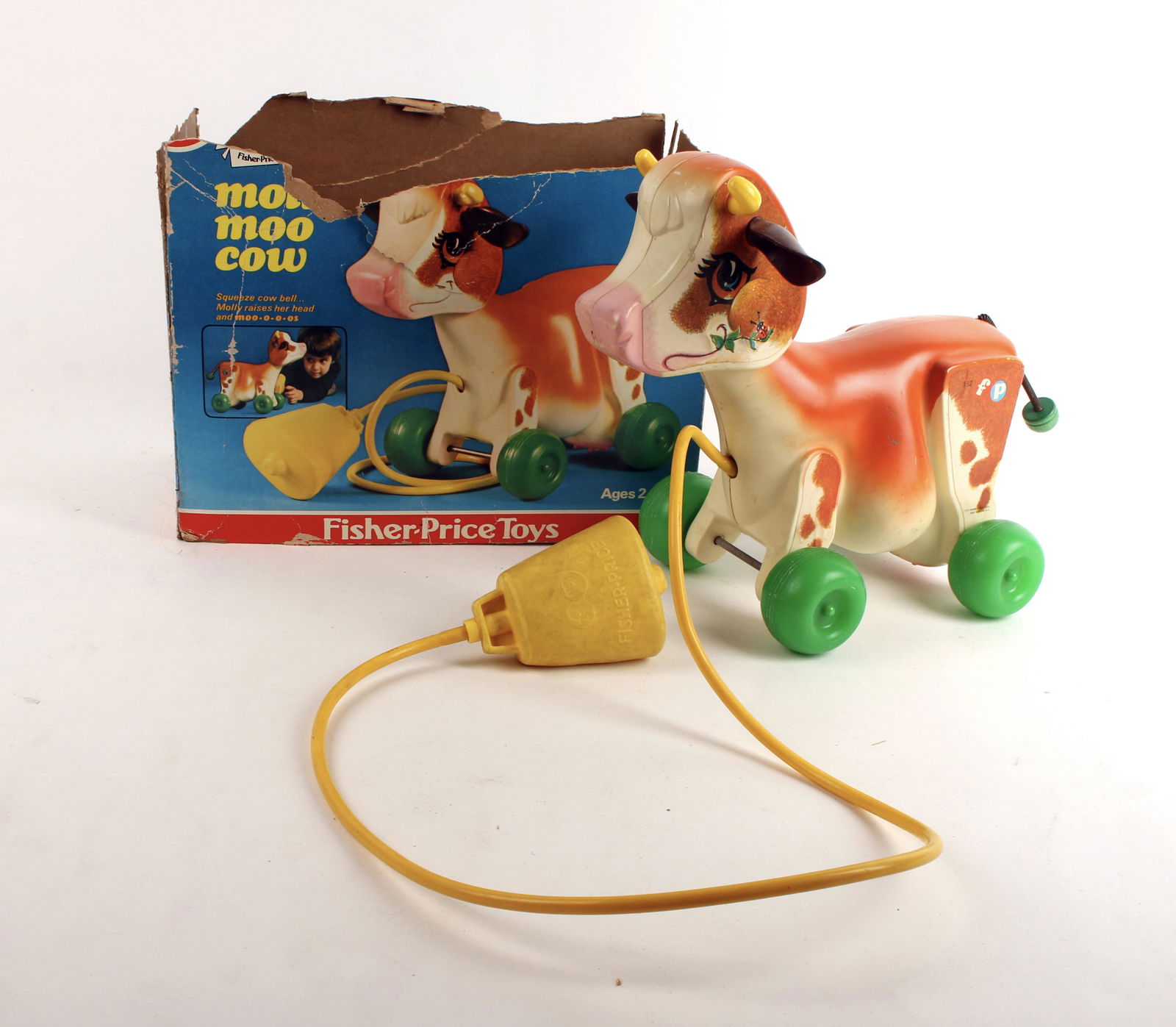FISHER PRICE MOLLY MOO COW WITH BOX 1972: Pull toy cow on wheels, spring tail wags. Push squeeze cow bell 'bulb' to make the cow's head move and make 'moo'ing sounds. 11" x 8" x 6" $100 - $200 Please contact us for high