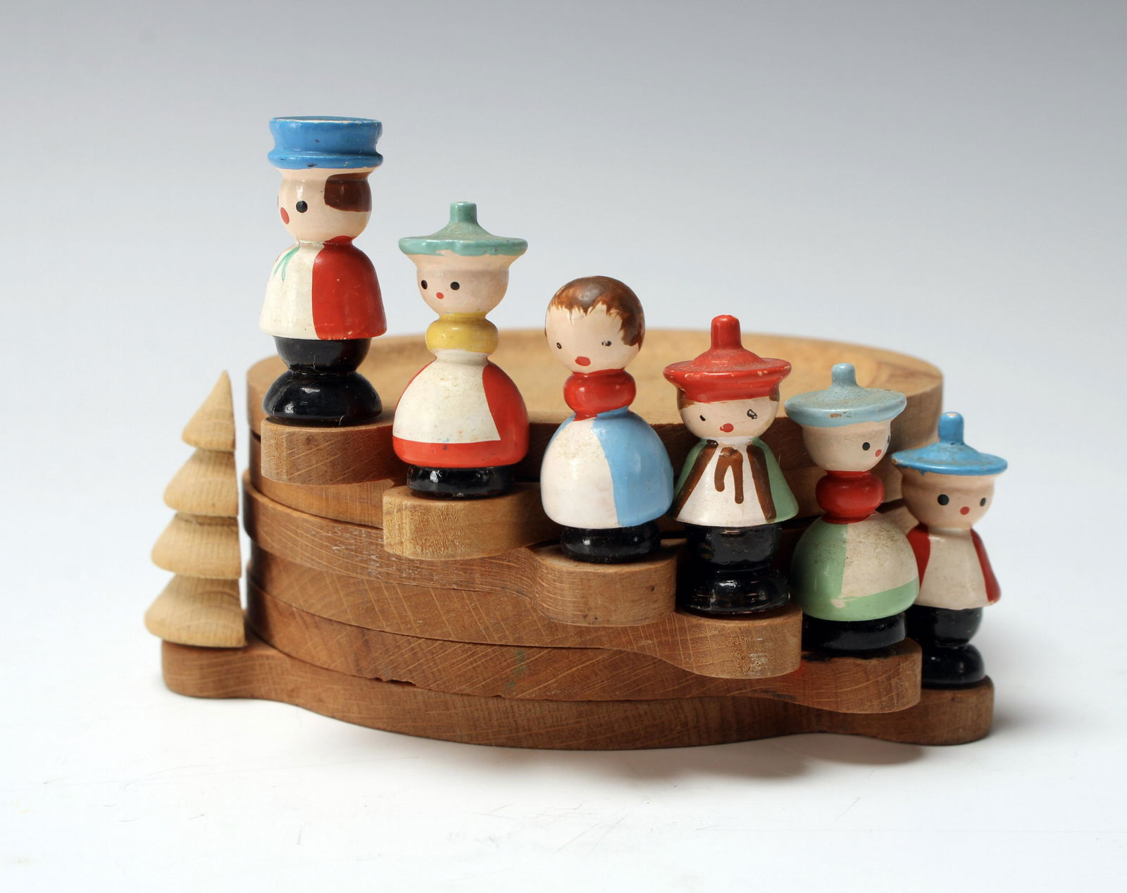 VINTAGE SCANDINAVIAN FOLK ART CARVED COASTERS: Set of vintage Scandinavian stackable coasters. 3 1/2" $40 - $80 Please contact us for high resolution images of this lot. Shipping: We are able to pack and s