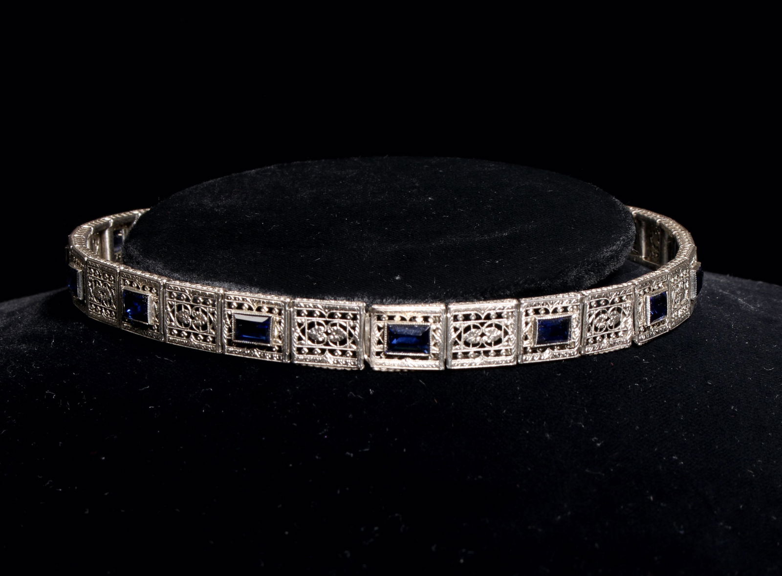 STERLING SILVER ART DECO CHOKER: Delicate filagree links with bezel set rectangular faceted faux sapphires. Classic art deco styling. 18.4g. Provenance: Major NYC fashion and antiques collector. Primarily collected in the 1980s