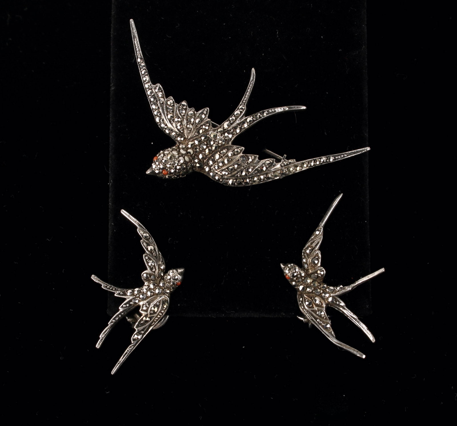 VINTAGE MARCASITE STERLING EARRING PIN & SWALLOWS: Beautifully crafted in Germany, these sterling swallows are covered in marcasites and have tiny red stone eyes. With French clip back earrings. Marked sterling Germany. Provenance: Major NYC fashion a