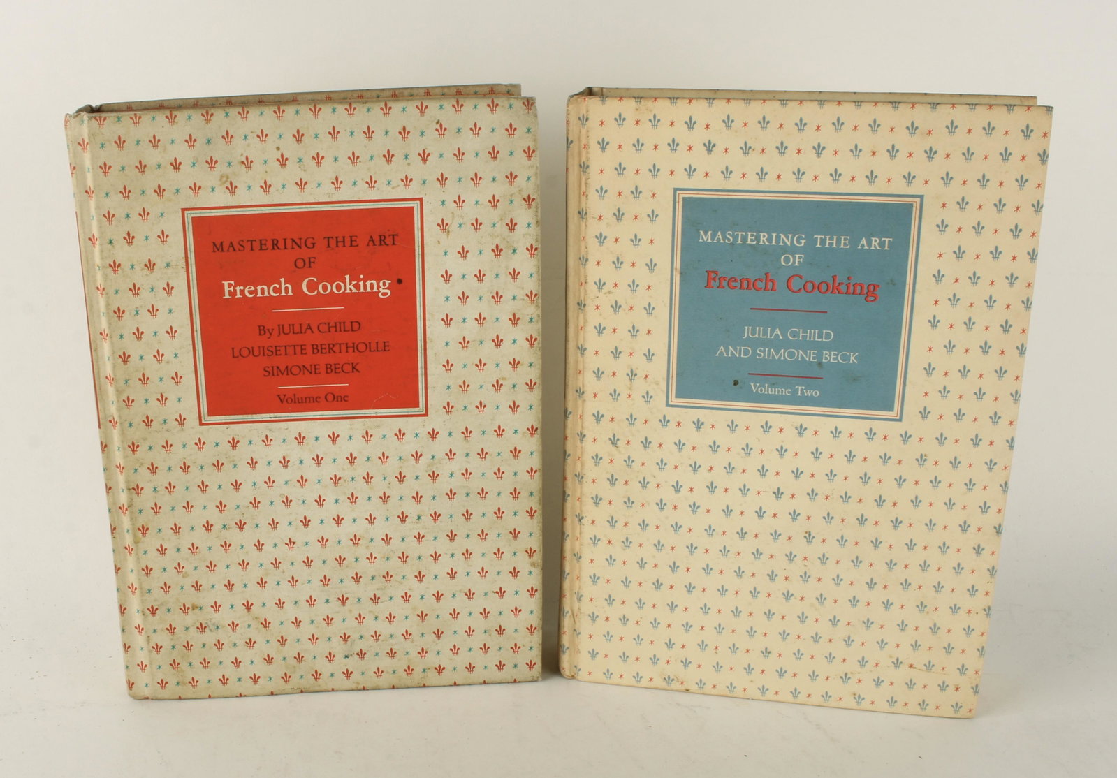 MASTERING ART OF FRENCH COOKING JULIA CHILD 1971: Volume one 1971 hard cover. Volume two 1973 hard cover. By Julia Child, Louisette Bertholle, and Simone Beck. 7 1/4" X 10 1/4" $20 - $40 Please contact us for high resolution images o