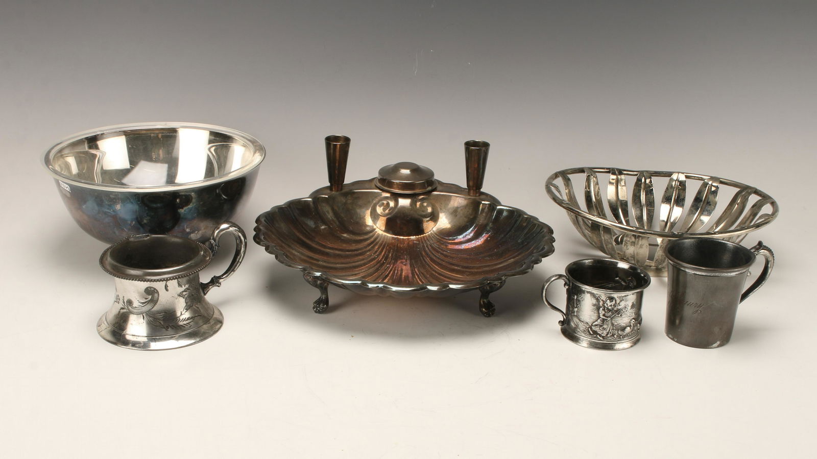LOT OF SILVERPLATE ITEMS: Marks include Reed & Barton, Sheffield, Rogers, and Queen City. Various decorative and serving items. 8" X 4" $20 - $40 Please contact us for high resolution images of this lot. <