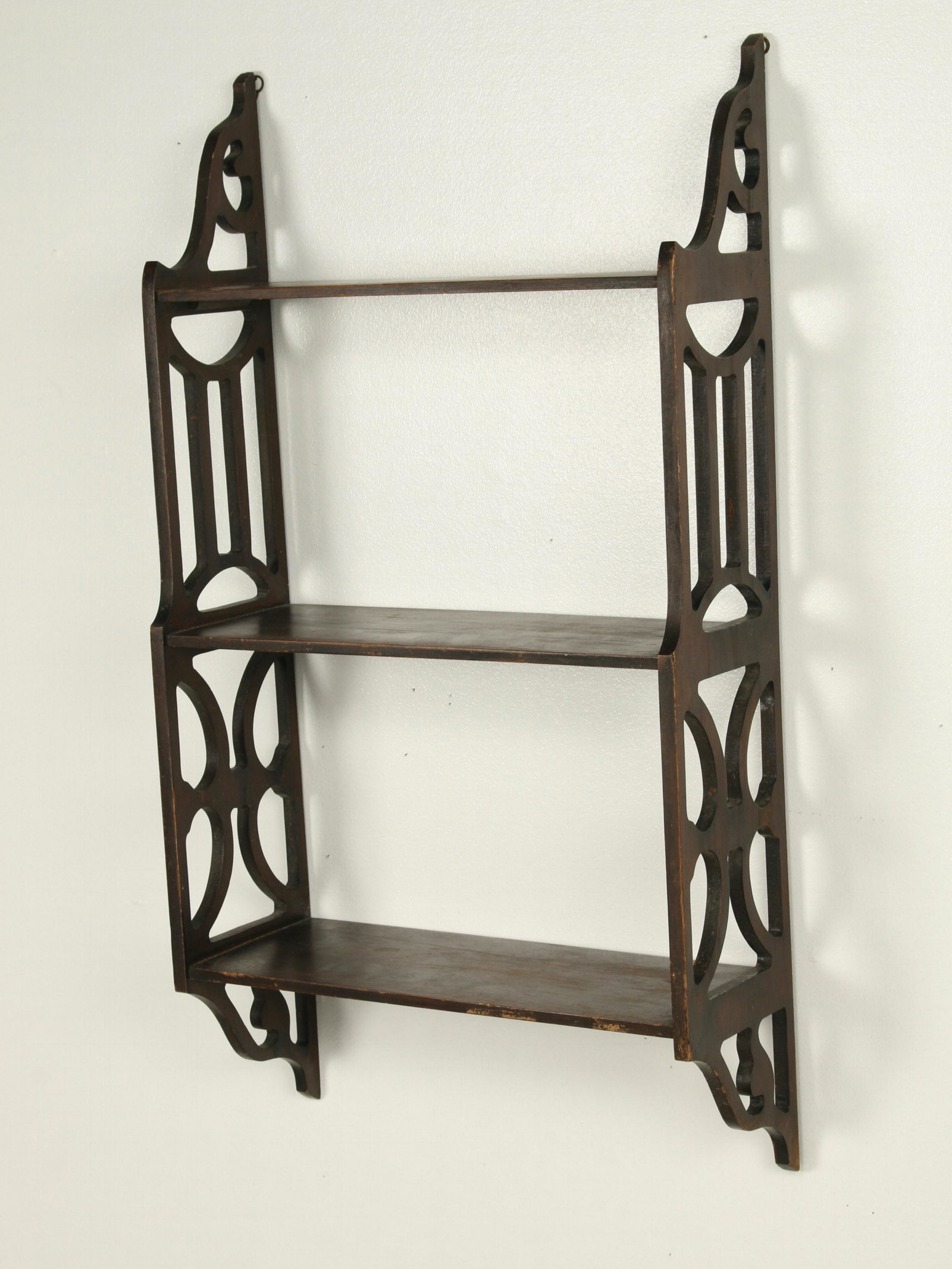 THREE TIER SCROLL SIDES WALL SHELF: Scroll work sides and three shelves. 16" X 29 1/2" $20 - $40 Please contact us for high resolution images of this lot. Shipping: We are able to pack and s