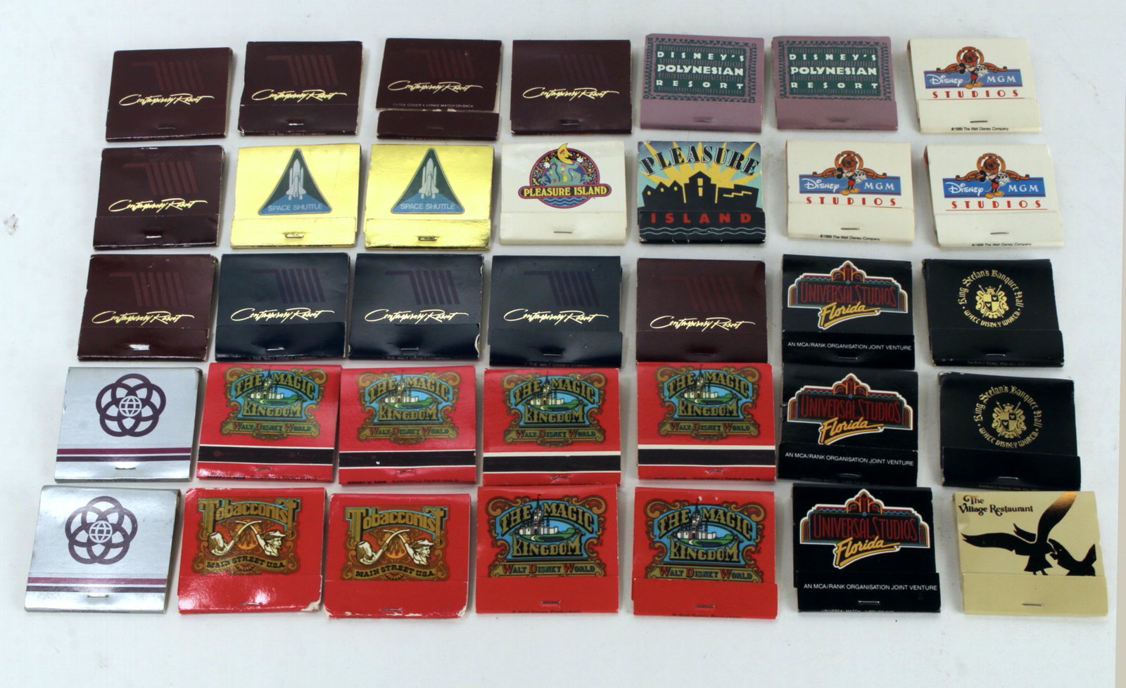 LOT OF VINTAGE FLORIDA DISNEY WORLD MATCHBOOKS: Disney branded matchbooks including MGM Studios, Polynesian, Contemporary Resort, Universal Studios, The Tobacconist Magic Kingdom, Epcot Center, Pleasure Island, Walt Disney World Village, and Space 