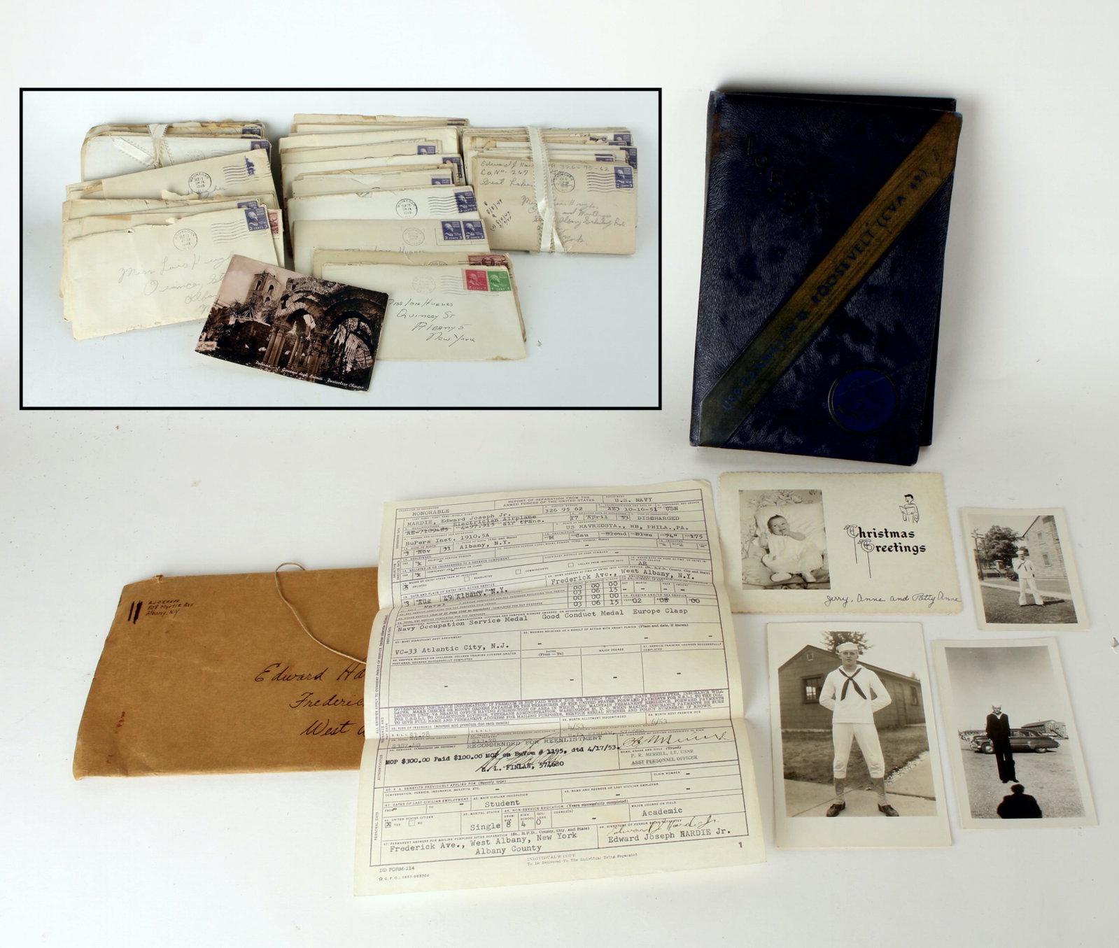LOT OF PERSONAL CORRESPONDENCE & NAVY EPHEMERA: Late 1940s - 1951 between Husband in the Navy and his wife. 1951 discharge papers. Notebook from USS Franklin D. Roosevelt aircraft carrier 1953. Some photos of Edward Joseph Hardie Jr. in uniform. Pr