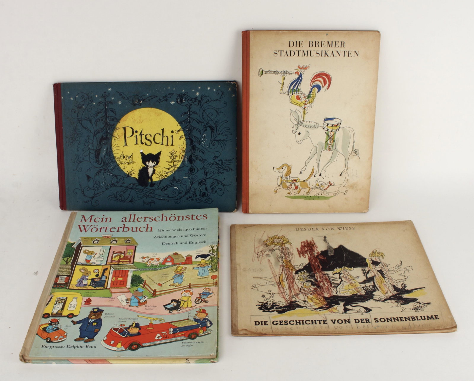 GERMAN CHILDRENS BOOKS PITSCHI, FISCHER, SCARRY: Assembled lot of four Childrens books in German Pitschi, two by Hans Fischer, Richard Scarry , and Ursula Von Weise. All in German, with the Richard Scarry Dictionary in German & English Pitschi b