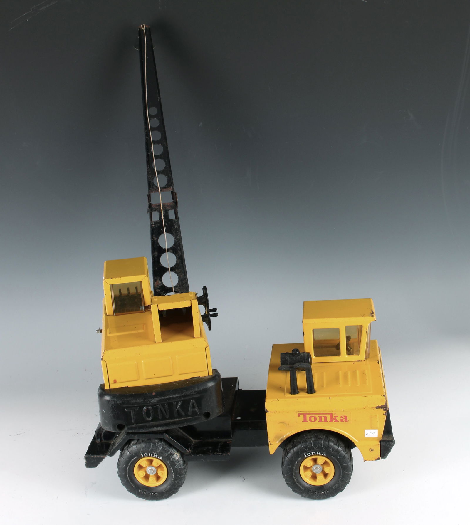 LARGE YELLOW TONKA CONSTRUCTION CRANE: Marked 37180 A on the bottom. 36 1/2" X 12" $40 - $80 Please contact us for high resolution images of this lot. Shipping: We are unable to ship this item