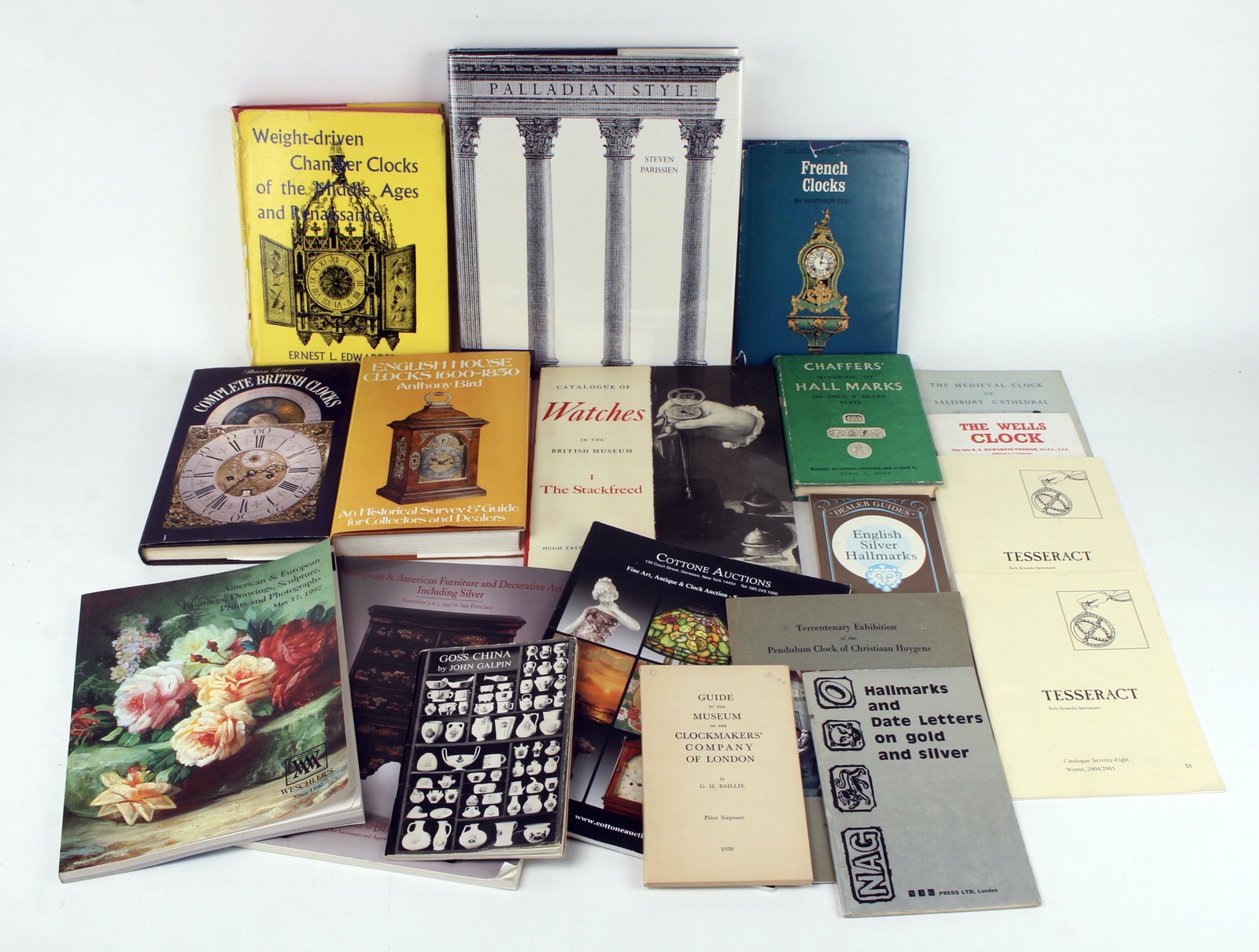 19 REFERENCE BOOKS ON ANTIQUES AND COLLECTIBLES: Including French clocks, British clocks, watches, art, and silver hallmarks. 10" X 12" $20 - $40 Please contact us for high resolution images of this lot. Shipping: