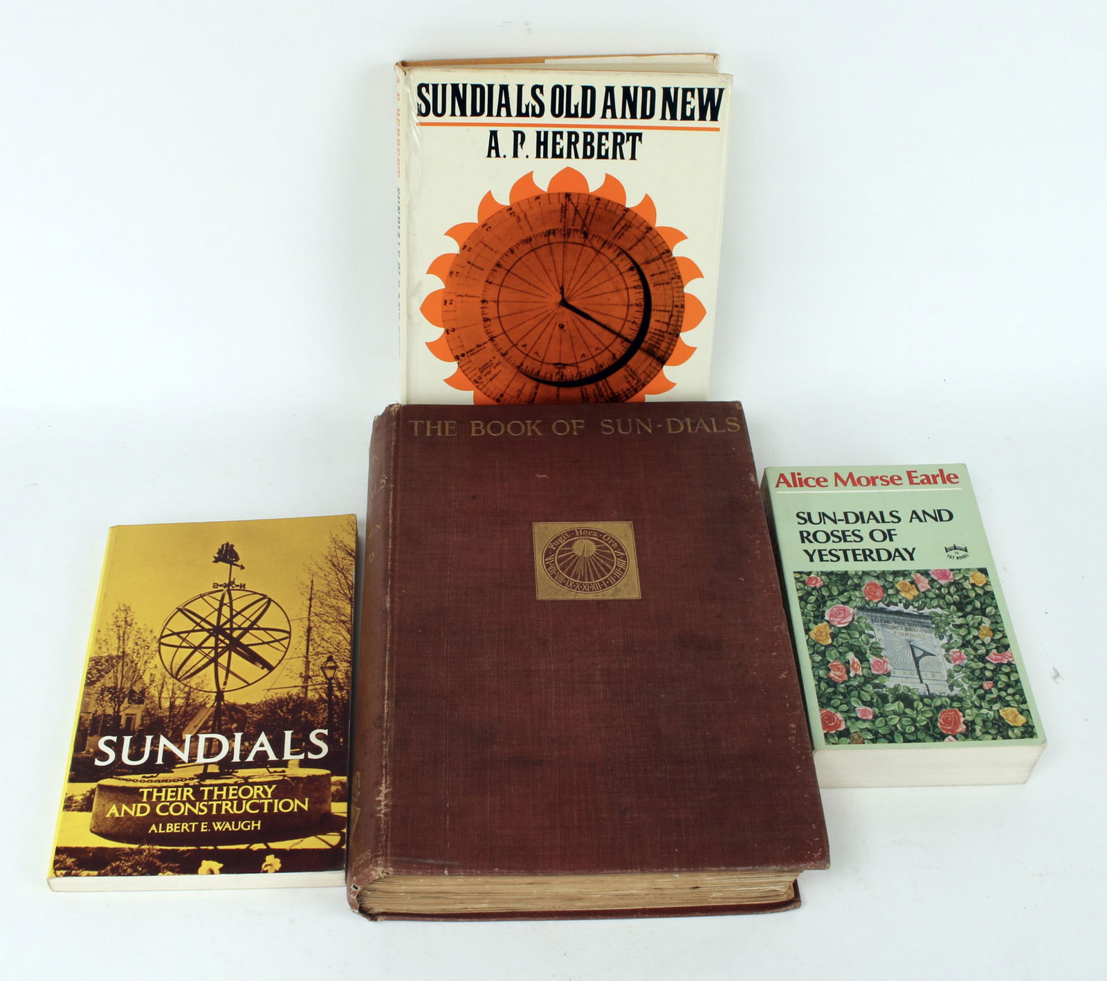 4 REFERENCE BOOKS ON SUNDIALS: Including hard cover and paperback. Covering all matters of sundials. 8" X 11 1/4" $20 - $40 Please contact us for high resolution images of this lot. Shipping: