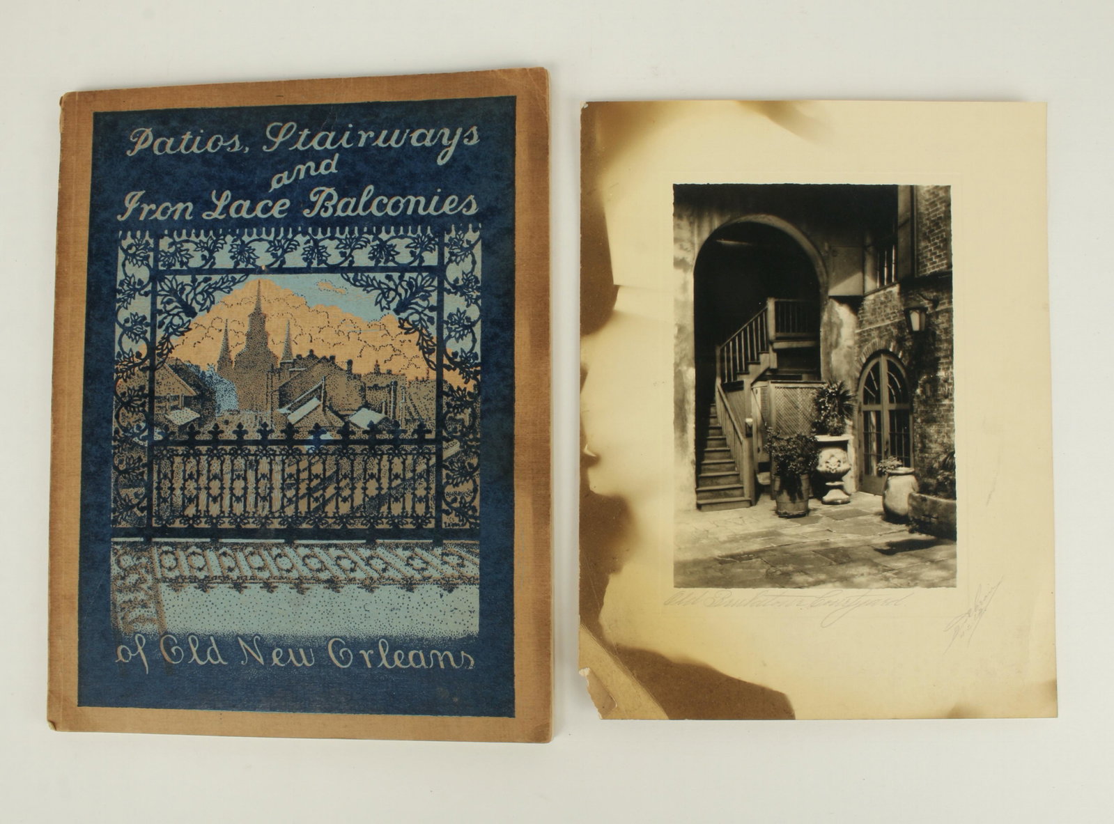 EUGENE DELCROIX PHOTO & PATIOS... OLD NEW ORLEANS: This lot includes an original signed and titled photograph of a scene similar to those reproduced in the book! Signed "Eugene A. Delcroix, N.O.LA" and titled “Old Brulatour Courtyard&r