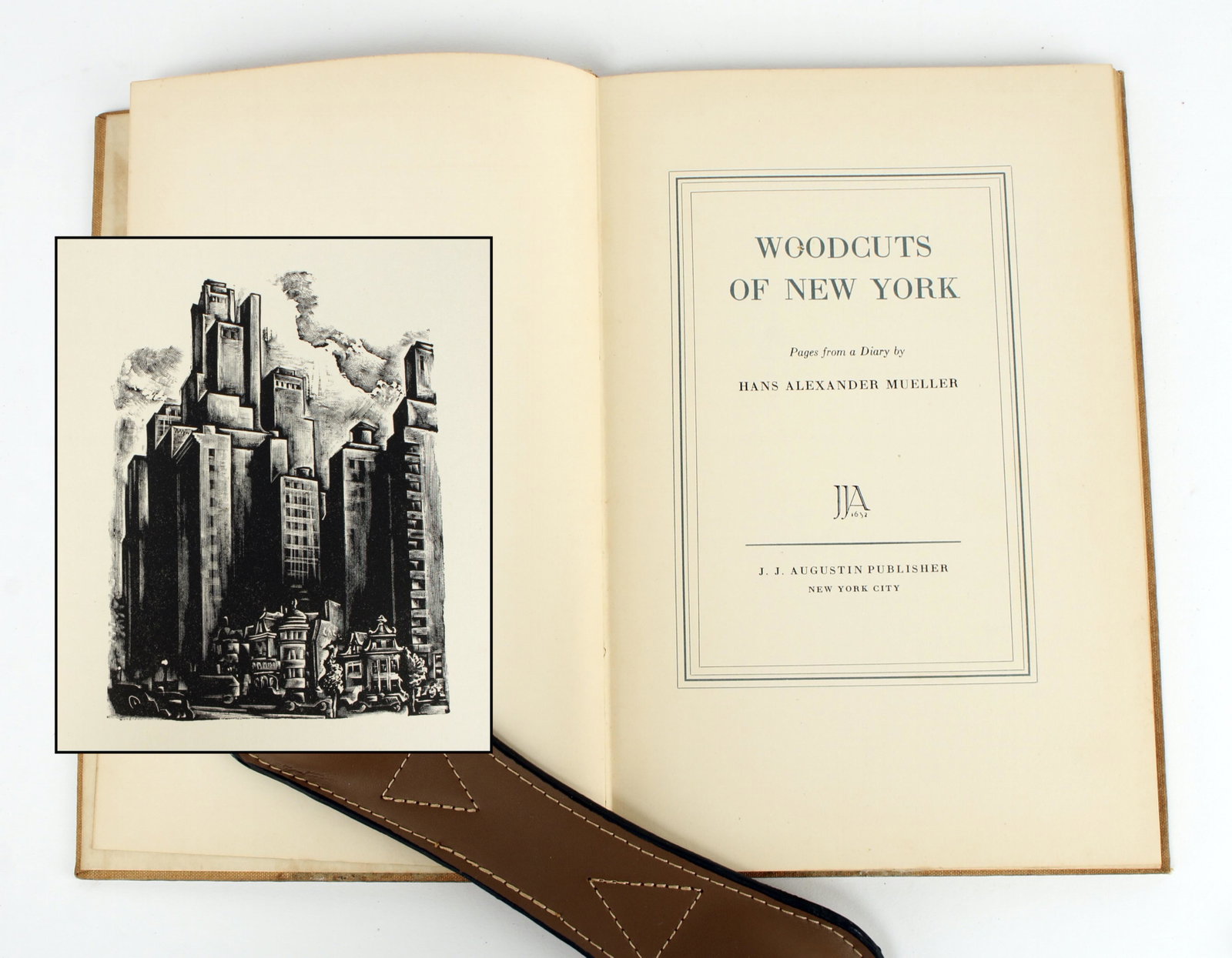 WOODCUTS OF NEW YORK BY HANS ALEXANDER MUELLER: Translated by Paul Standard), Pub. J.J. Augustin, Flyleaf inscribed “Robert Benchley, Jr.” Natural tan cloth over boards with the title stamped in black ink stamped title on the spine and 