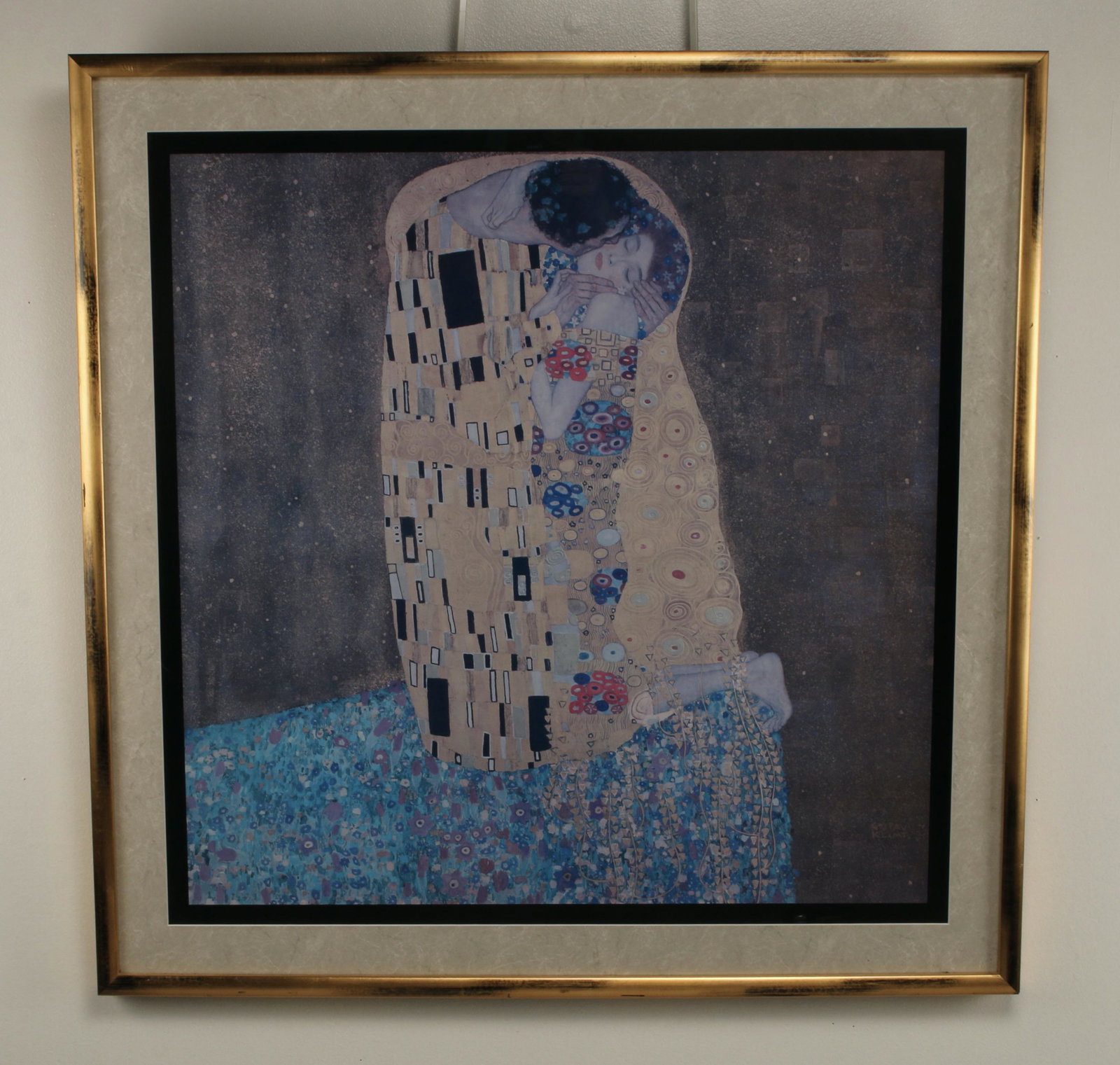 LARGE FRAMED THE KISS PRINT BY KLIMT: Large framed and matted Gustav Klimt print of his famous painting, "The Kiss." 32 1/2" X 33" $40 - $80 Please contact us for high resolution images of this lot. Shippi