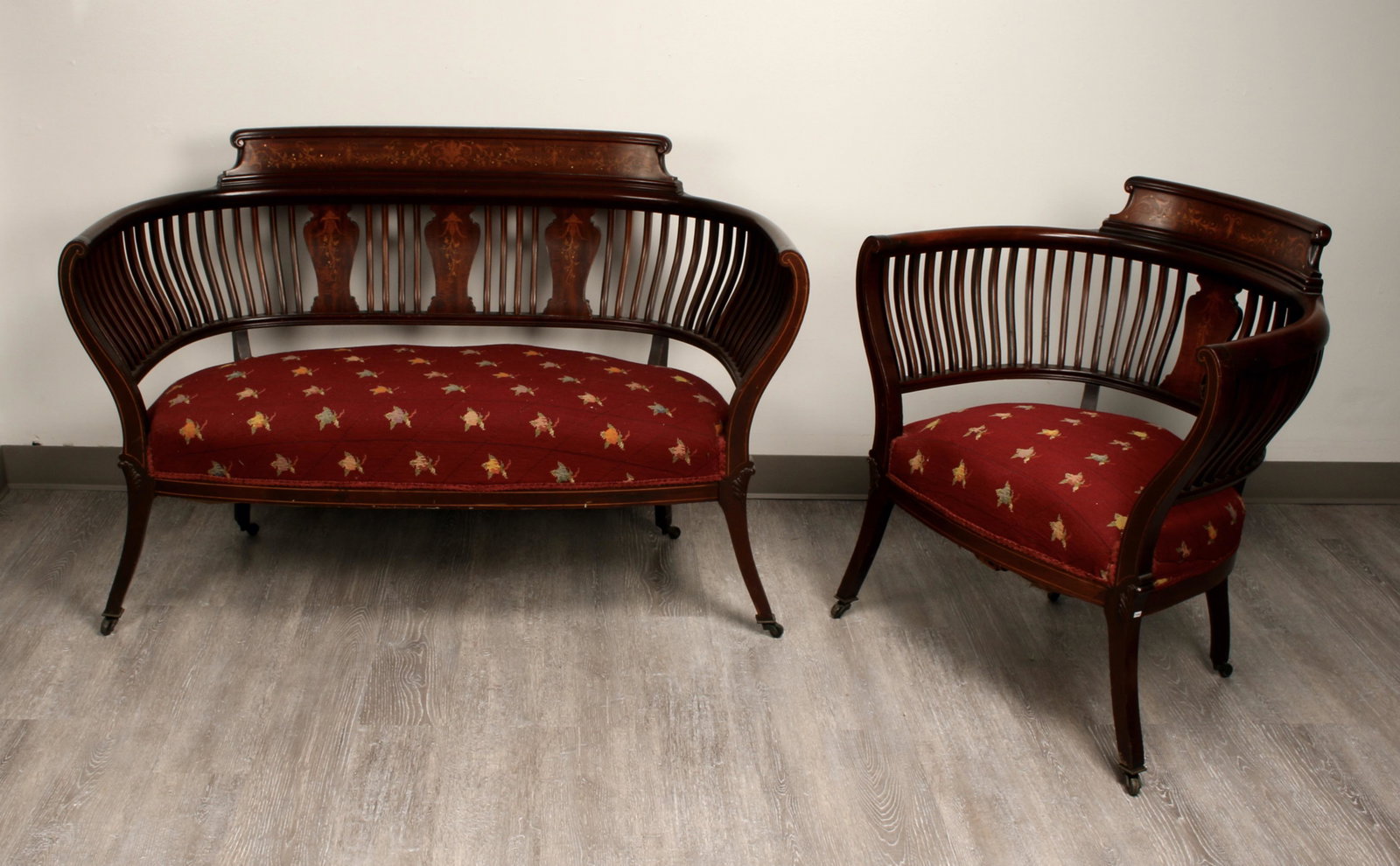 ANTIQUE BARREL BACK INLAID SETTEE AND CHAIR: With hand needlepointed seats. Urn form backsplat and linear inlay on barrel back slats and front. Delicate tendril designs inlaid with wood and mother of pearl. On casters. Single urn on chair, three