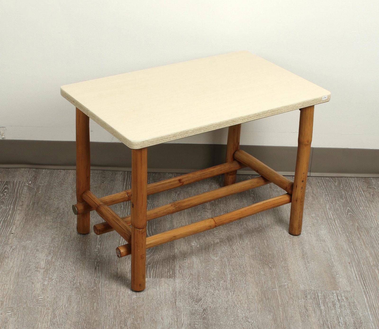 VINTAGE BAMBOO SIDE TABLE: Sturdy table with bamboo legs and Formica top. Nice addition to your tiki bar or Florida room. 24" X 15" X 17 1/2" $20 - $40 Please contact us for high resolution images of this