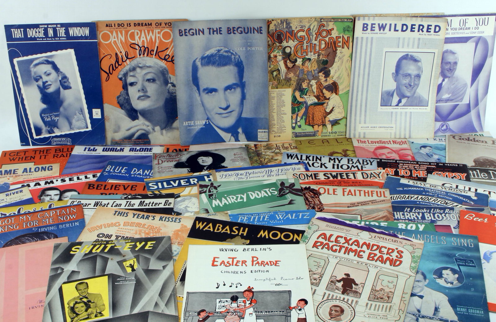 LOT LARGE OF SHEET MUSIC: Irving Berlin, Cole Porter, Tommy Dorsey, and more. $20 - $40 Please contact us for high resolution images of this lot. Shipping: We are able to pack and ship this item to an address in the