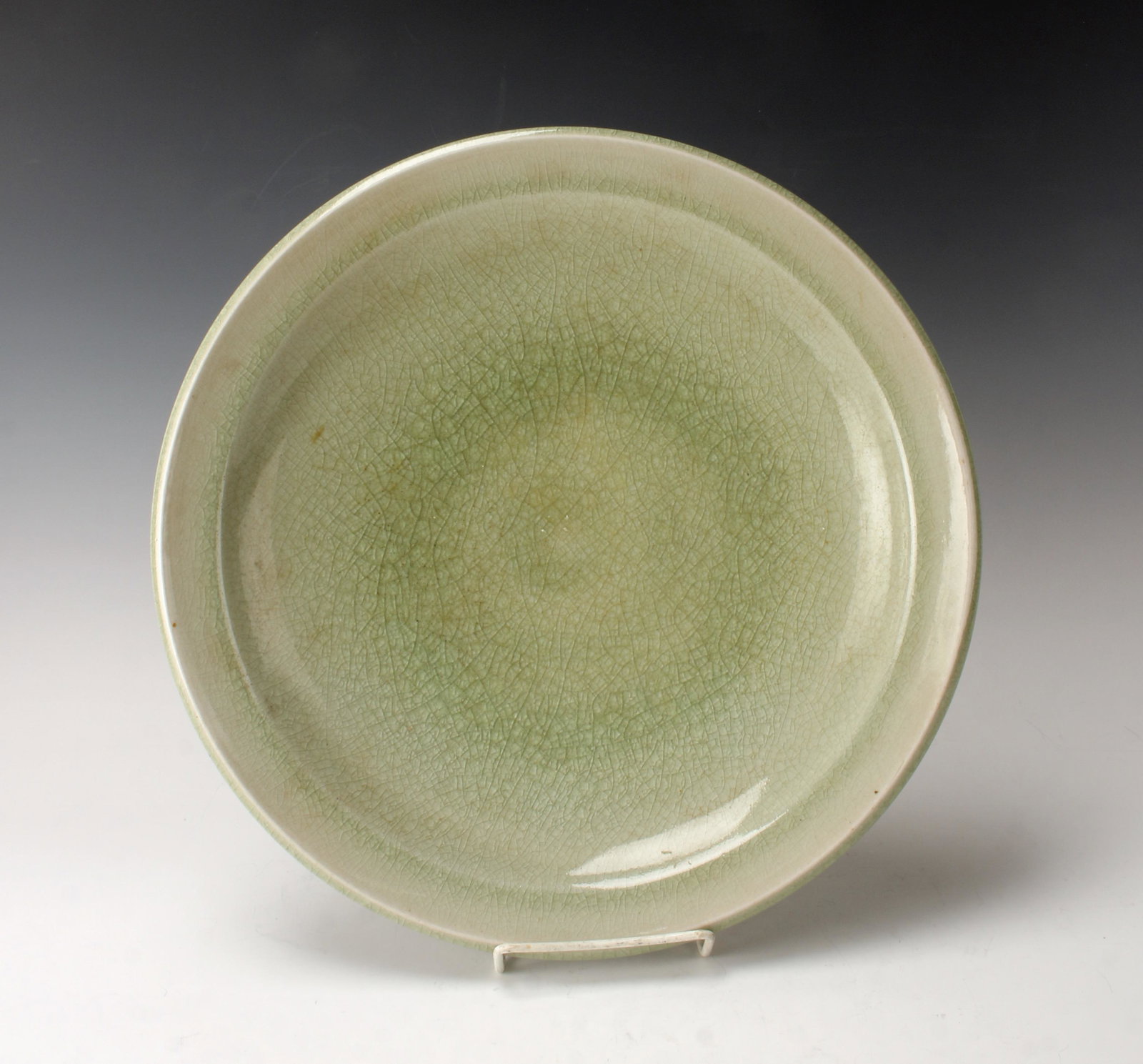 ANTIQUE CHINESE CELADON CRACKLE CHARGER: Celadon charger with all over craquelure. Provenance: Collection from Australia. 14" X 2 1/2"