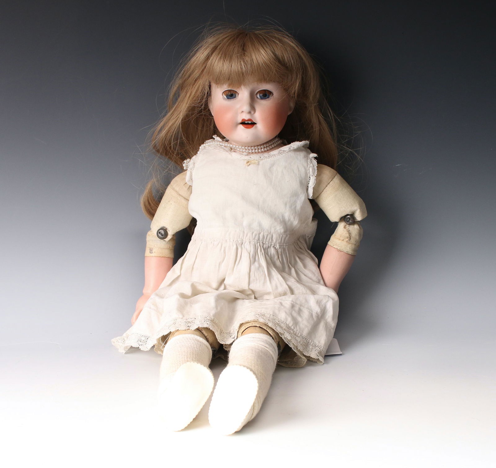 MORIMIRA BROTHERS LEATHER & PORCELAIN DOLL (1 of 7)