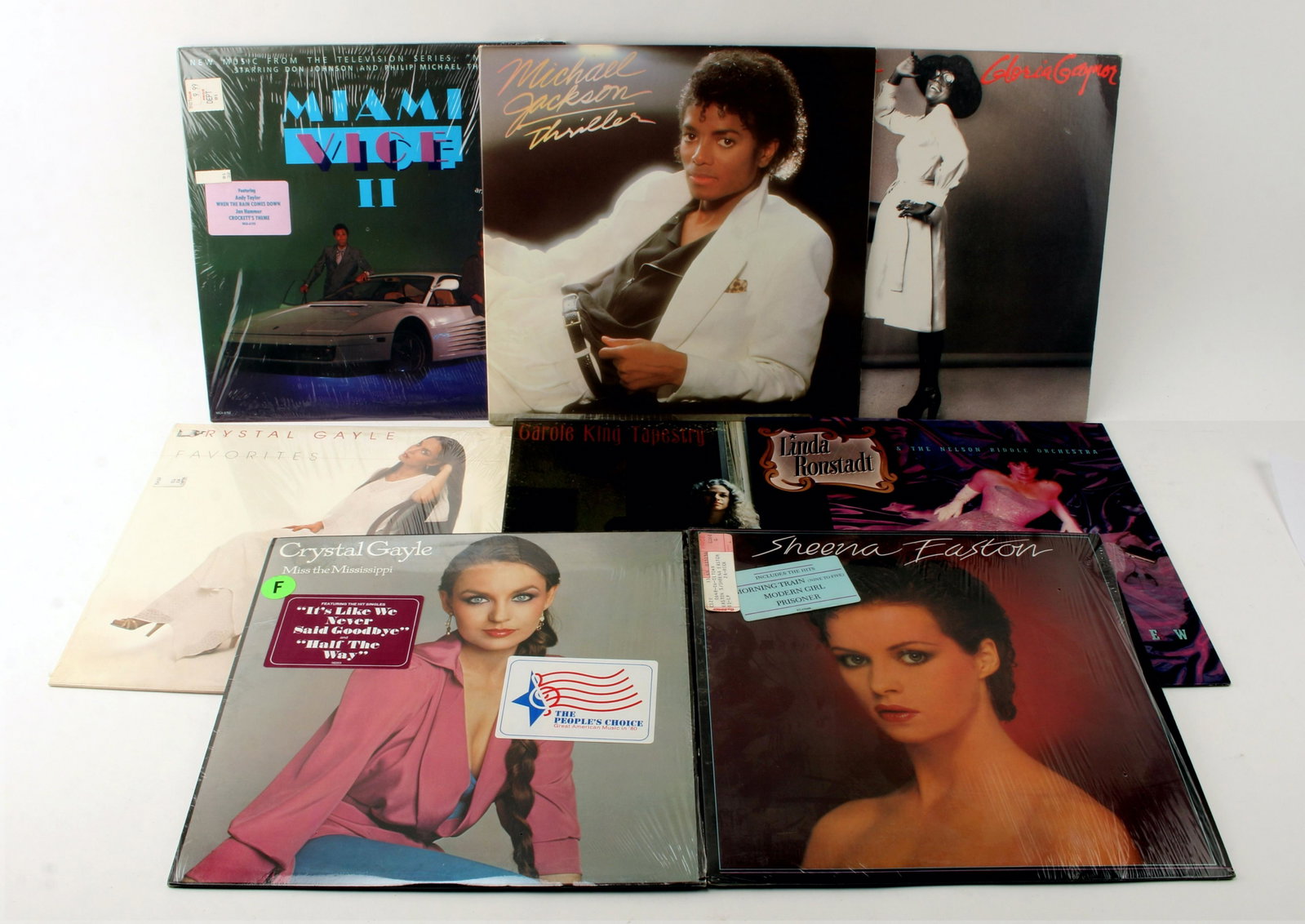 LOT OF 80'S VINYL: Includes Thriller by Michael Jackson, Miami Vice II, Gloria Gaynor, Sheena Easton, Crystal Gayle, Linda Ronstadt, and Carole King. $40 - $80 Please contact us for high resolution images of this lot. S