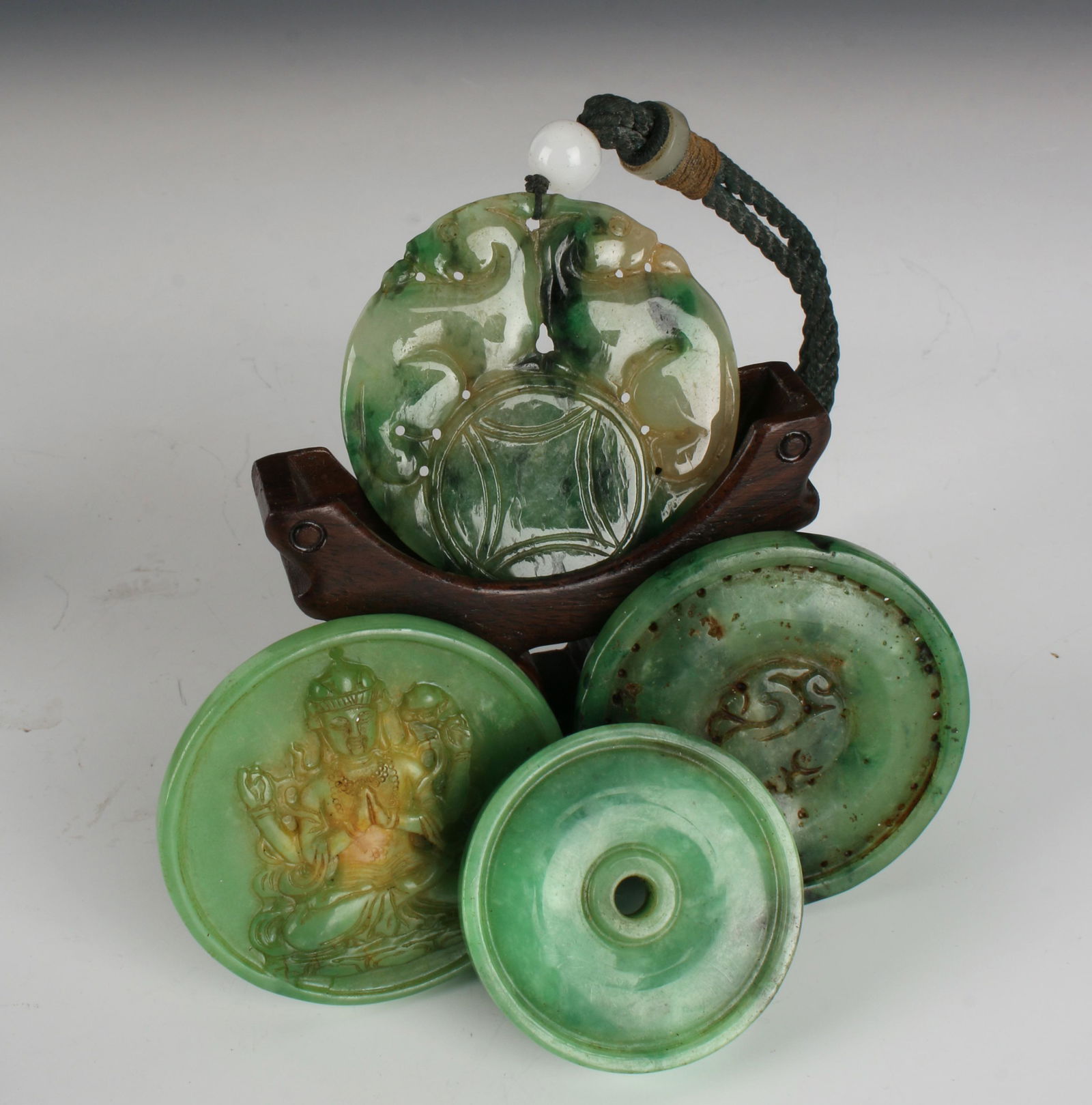 ASSEMBLED LOT OF FOUR CARVED JADE DISCS (1 of 7)