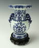 BLUE & WHITE VASE ON WOODEN STAND