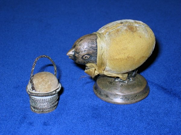 Pin cushions for the sewing enthusiast: Two pin cushions for the sewing enthusiast: one a chicken form the other an egg form. Probably 19th C. These unusual items were part of the Joan Stephens collection (late famous needlework collector) 