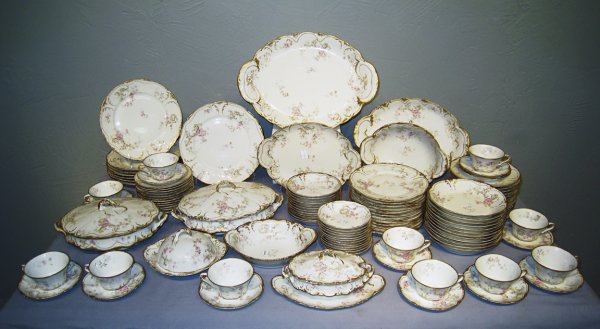Limoges 100 piece dinner ware set: Theodore Haviland, Limoges dinner ware set, consisting of over 100 pieces: to include: 8 dinner plates and 11 desert plates; 12 larger bowls; 12 roll and 12 butter plates; 12 soups, 11 cups and saucer