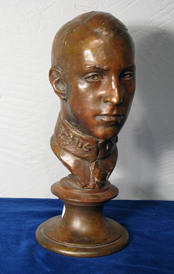 A bust in bronze of a young soldier : A bust in bronze of a young soldier reportedly to have been Leonard Thomas, and signed Gerome Brush. About 13" in height