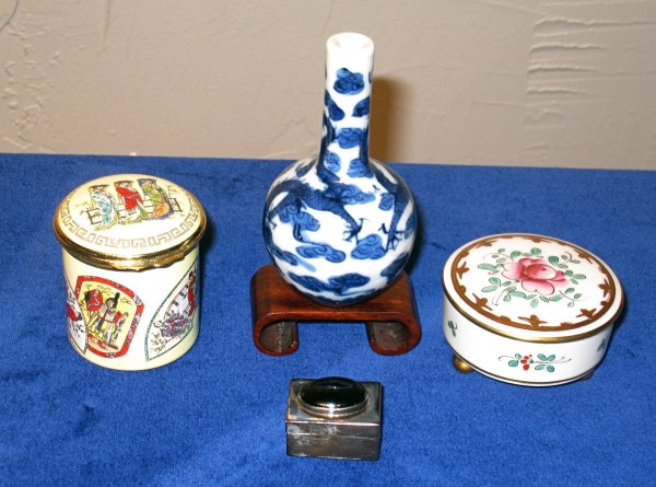 A collection of four pill or patch boxes: A collection of four pill or patch boxes, including one marked Limoges & Halycon Ltd Edition. 20th C.