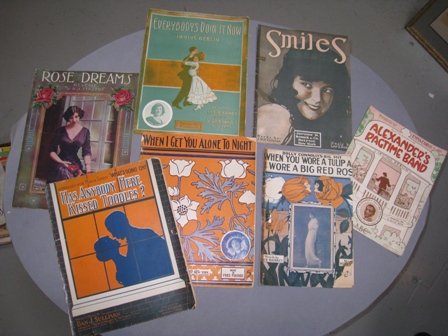 A mixed lot of many music scores,: A mixed lot of over 100 music scores, some signed by the artists, many covers exhibiting pop art style of the times.