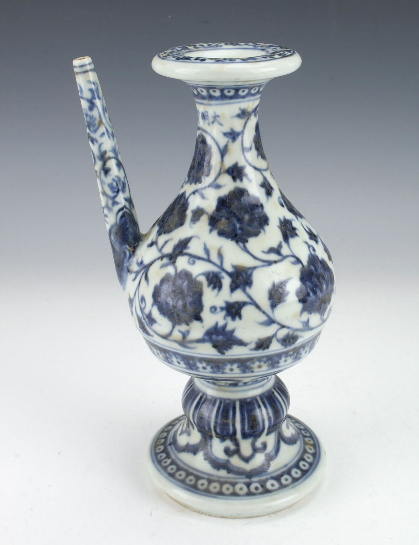 CHINESE ANTIQUE BLUE AND WHITE EWER: Blue and white ewer with six character mark on neck, flower and tendril design on the body and spout, and various borders. Provenance: private collection from Massachusetts. 4" X 8 1/2"</
