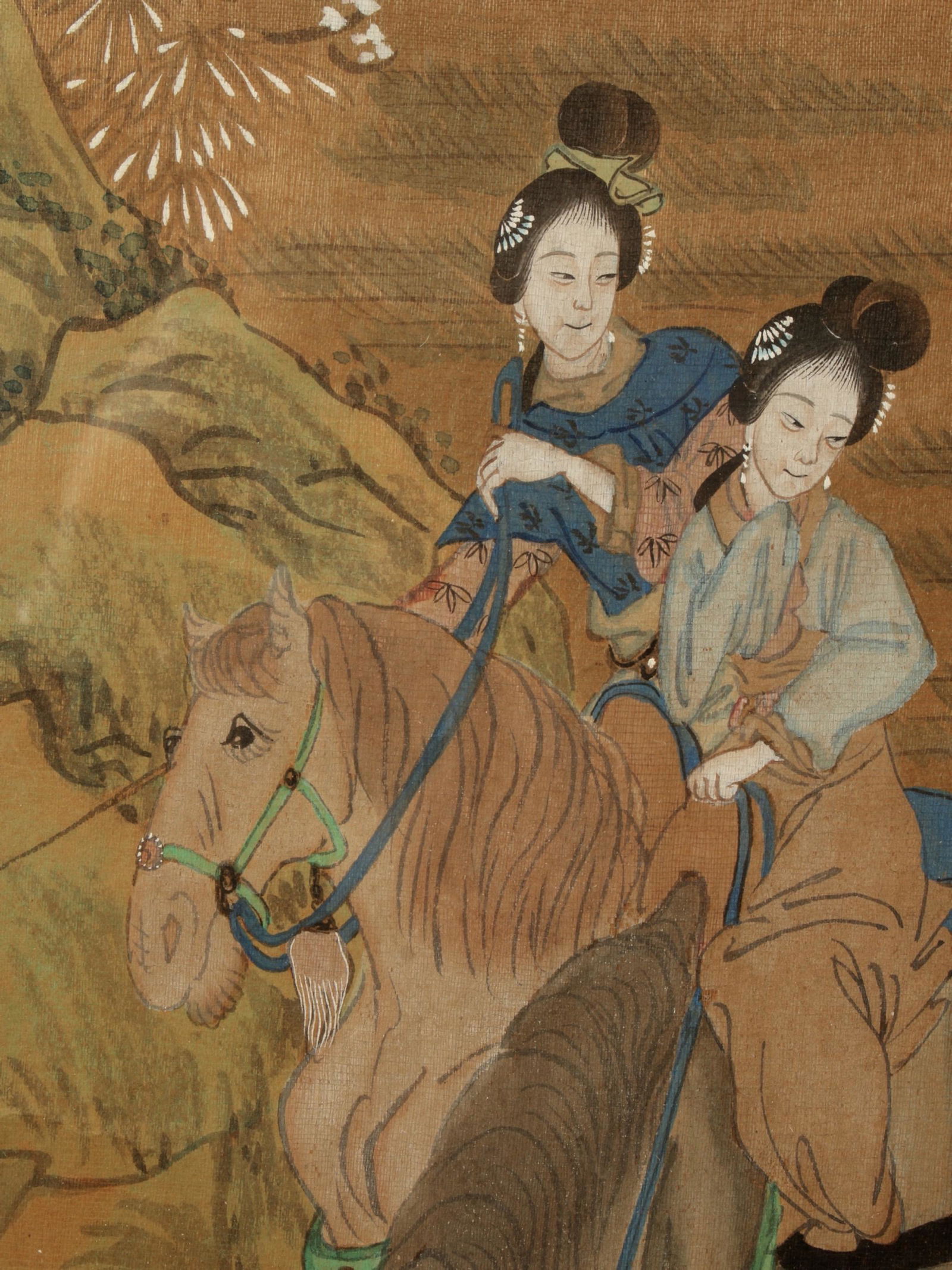 FRAMED SCROLL PAINTING OF WOMEN ON HORSEBACK: Two pair of women travelers on a mountain pass. Boulders, trees, and bright white blossoms are along their fenced path. Painted in great detail. Bordered in gold brocade. Bronze hangers. 58 1/2"