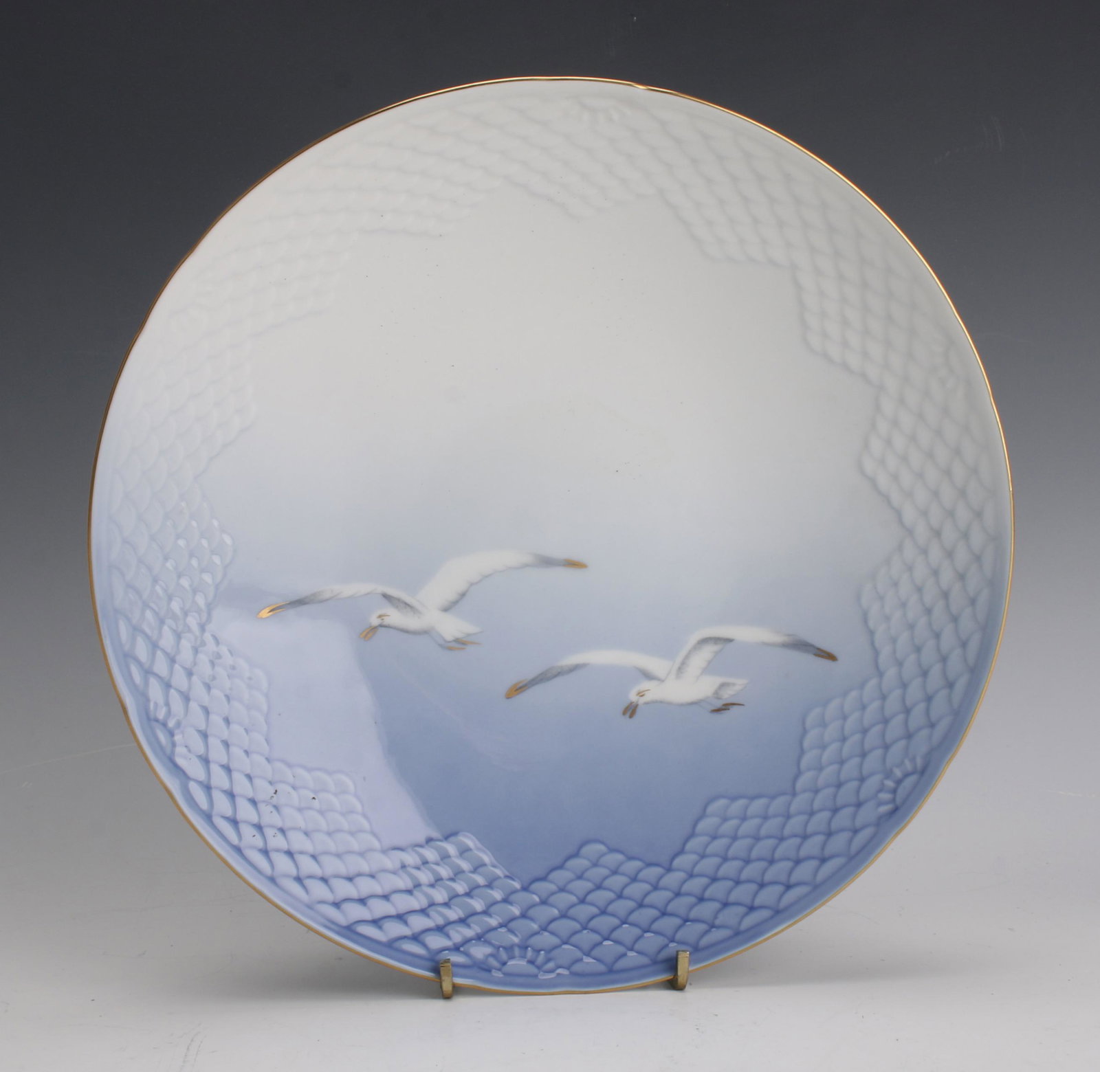 B&G SEAGULL FOOTED BOWL DENMARK: Footed seagull bowl by Bing & Grondahl, Demark. Stamped on bottom "E9H19". 9 1/2" X 3" $100 - $200 Please contact us for high resolution images of this lot. Shippi
