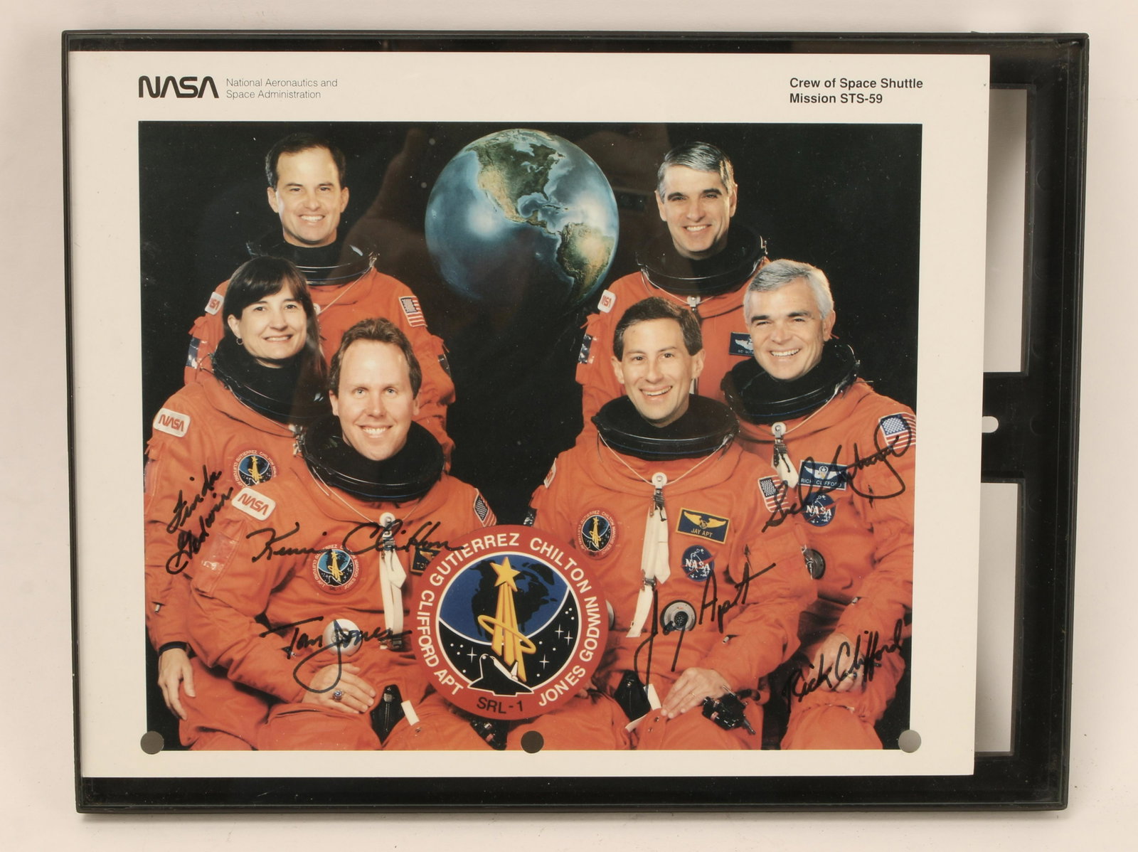 SIGNED PHOTO OF NASA CREW MISSION STS-59: Photo of crew with signatures on over suits. Information on back. Converse Auctions Does not Authenticate Collectibles 11" X 8 3/4" $20 - $40 Please contact us for high resolution