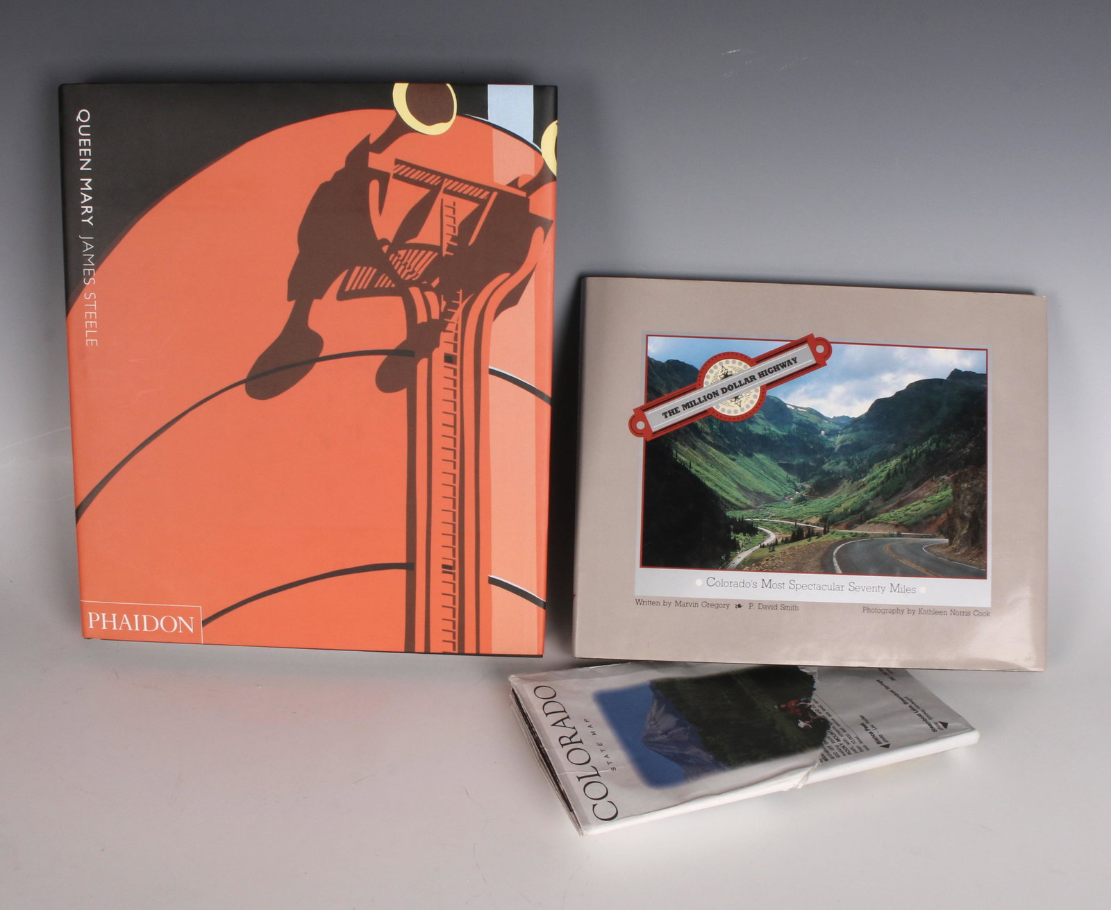 PHAIDON QUEEN MARY AND COLORADO 70 MILES BOOKS: Queen Mary by James Steele, the book features plans, photos, menus. Colorado book by Marvin Gregory and P. David Smith. 10" X 12" $40 - $80 Please contact us for high resolution image