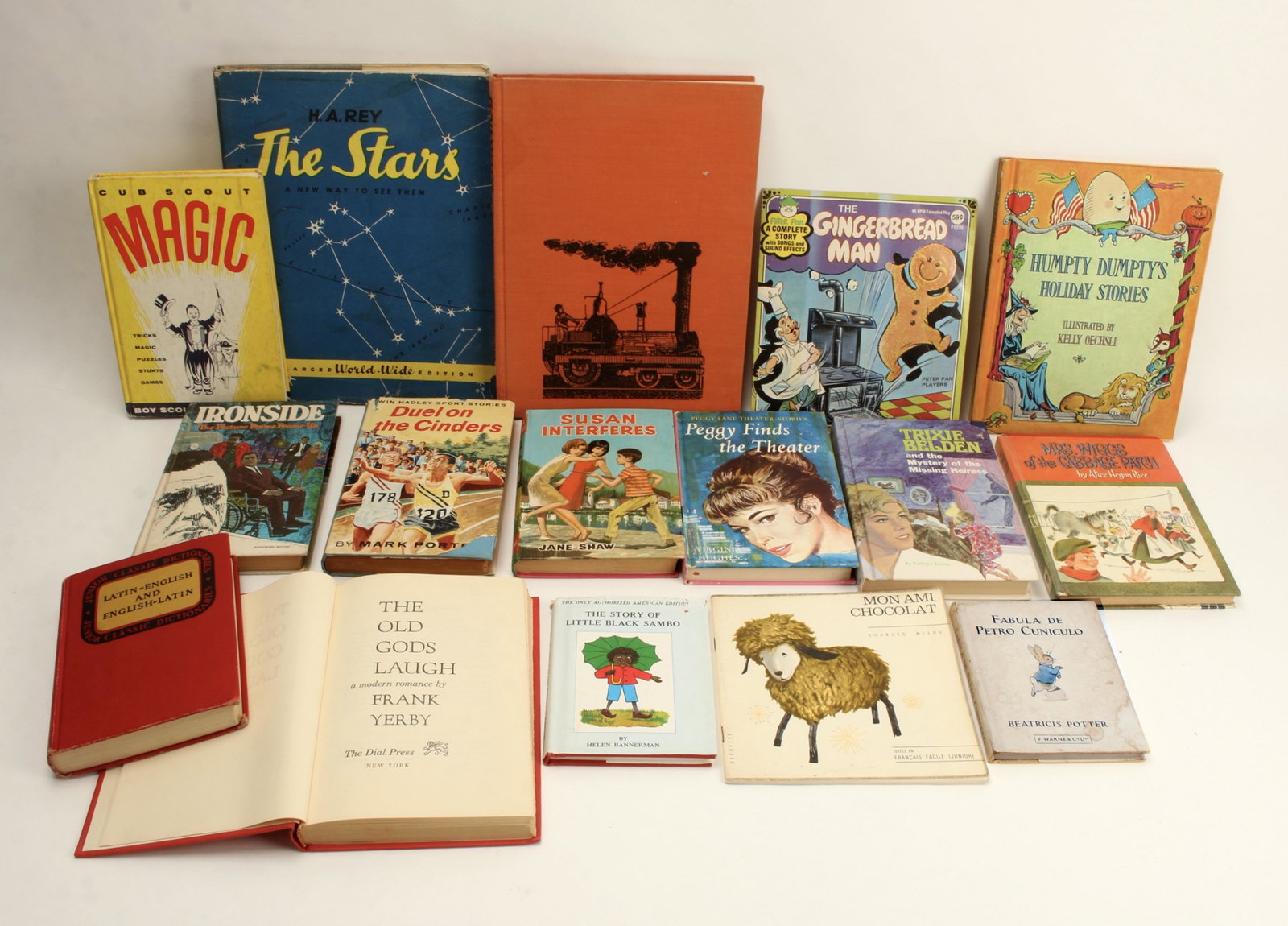 ASSORTED LOT OF BOOKS FROM THE 1960S 1970S: Fabula De Petro Cuniculo by Beatrix Potter, Translated by E. Perot Walker into Latin. Published by Frederick Warne & Co., Ltd., London, Hard Cover. Dust Jacket Condition: Good