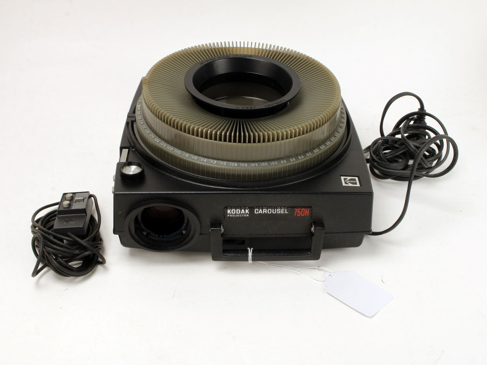 KODAK CAROUSEL 750H PROJECTOR IN BOX: With tray and remote. 12" X 11" $20 - $40 Please contact us for high resolution images of this lot. Shipping: We are able to pack and ship this item to a
