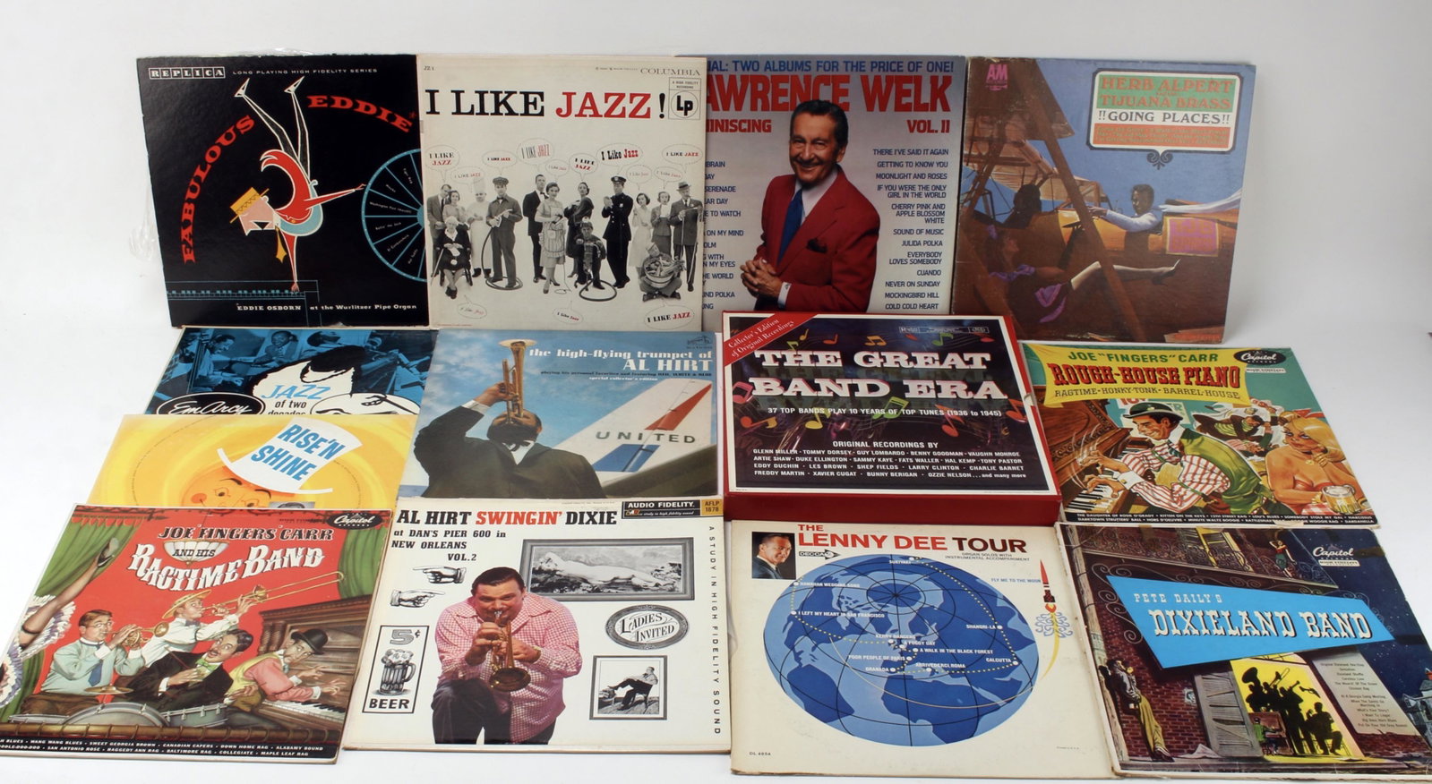ASSORTED LOT OF RECORDS: Lawrence Welk, Herb Alpert, jazz, ragtime. $20 - $40 Please contact us for high resolution images of this lot. Shipping: We are able to pack and ship this item to an address in the United S