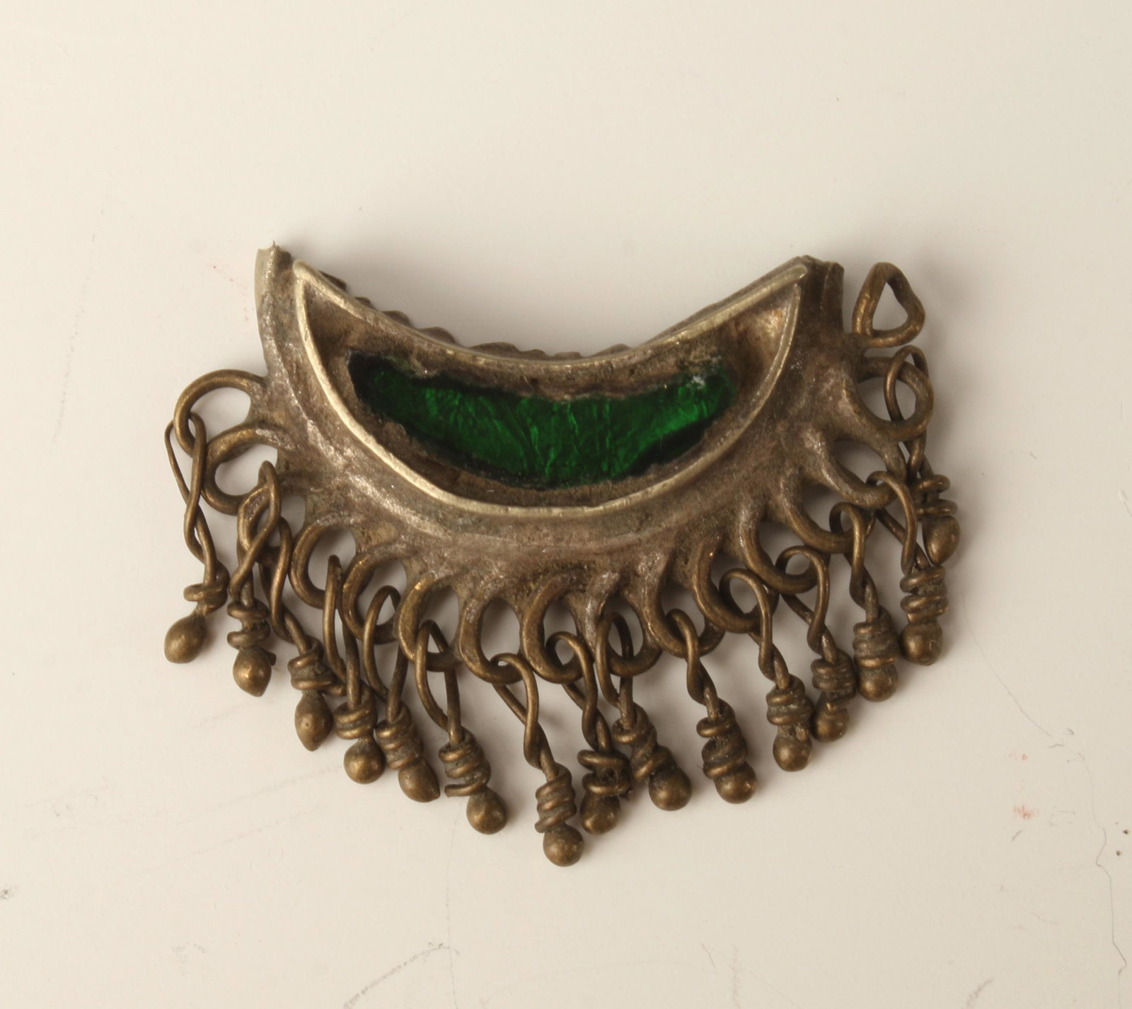 OTTOMAN ISLAMIC TALISMAN: Crescent moon form with small pendants around the edge. 3/4" $40 - $80 Please contact us for high resolution images of this lot. Shipping: We are able to pack